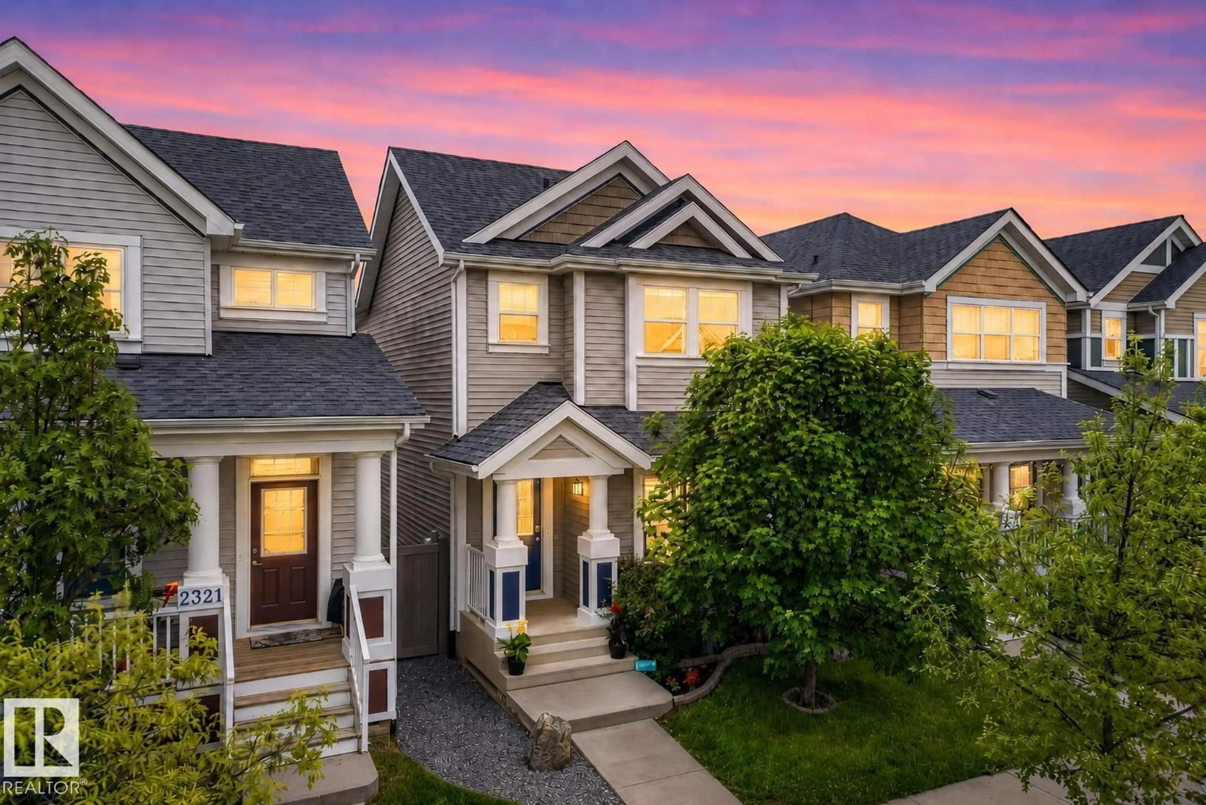 Home with vinyl exterior material, street for 2325 69A ST, Edmonton Alberta T6X1Z3