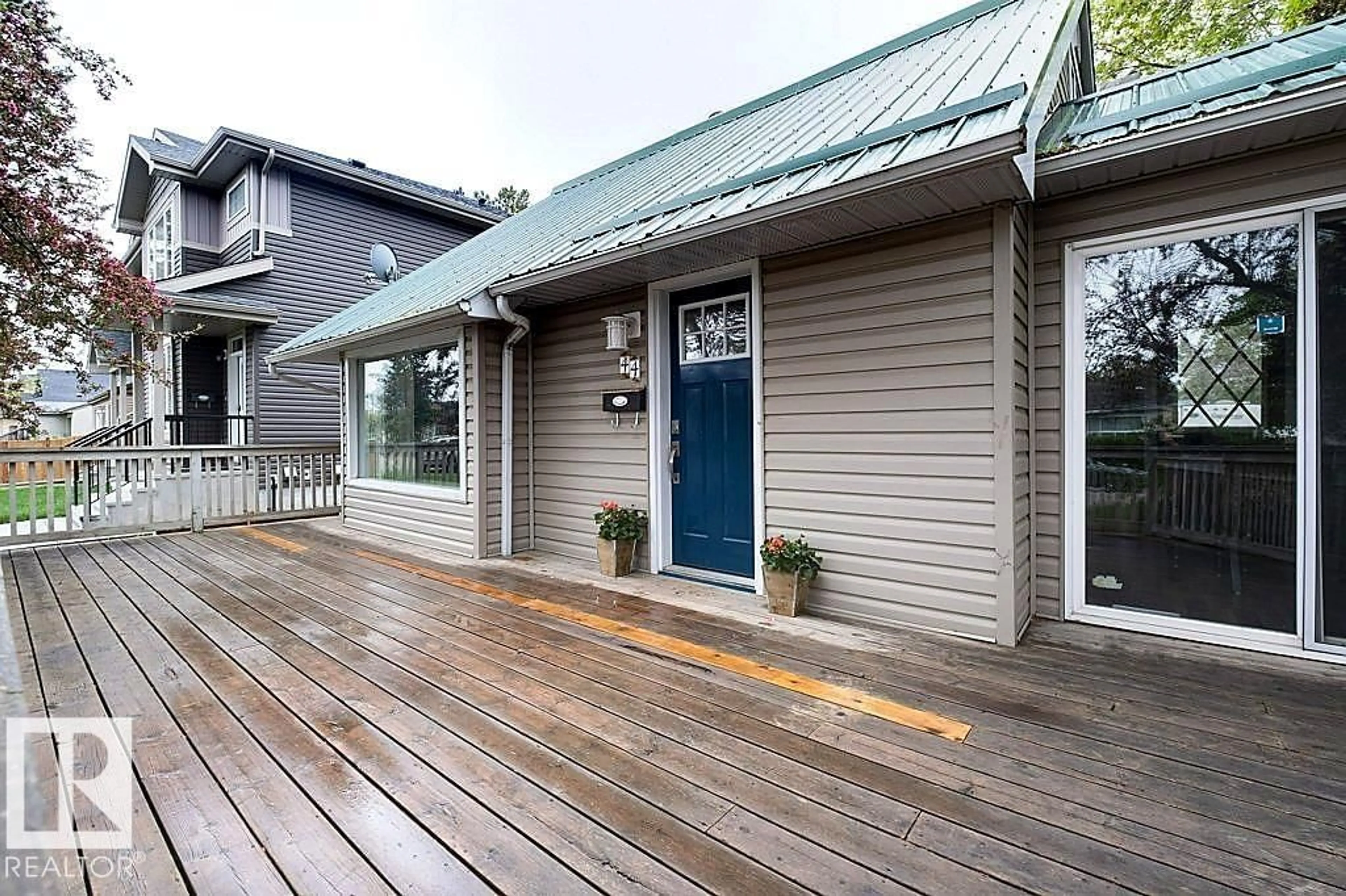 Home with vinyl exterior material, street for NW - 10344 162 ST, Edmonton Alberta T5P3M2