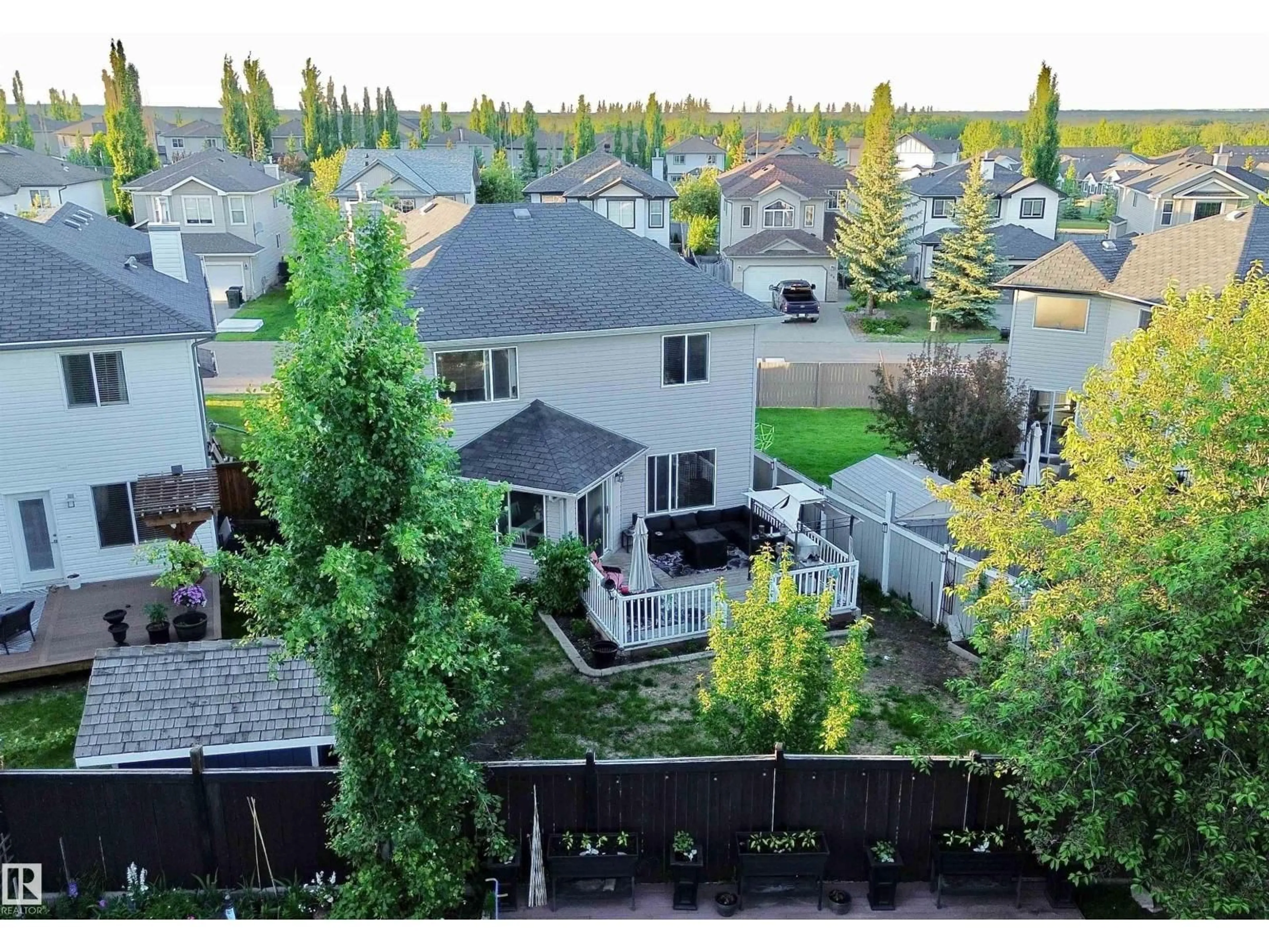 A pic from outside/outdoor area/front of a property/back of a property/a pic from drone, unknown for 105 GREYSTONE CR, Spruce Grove Alberta T7X0A7