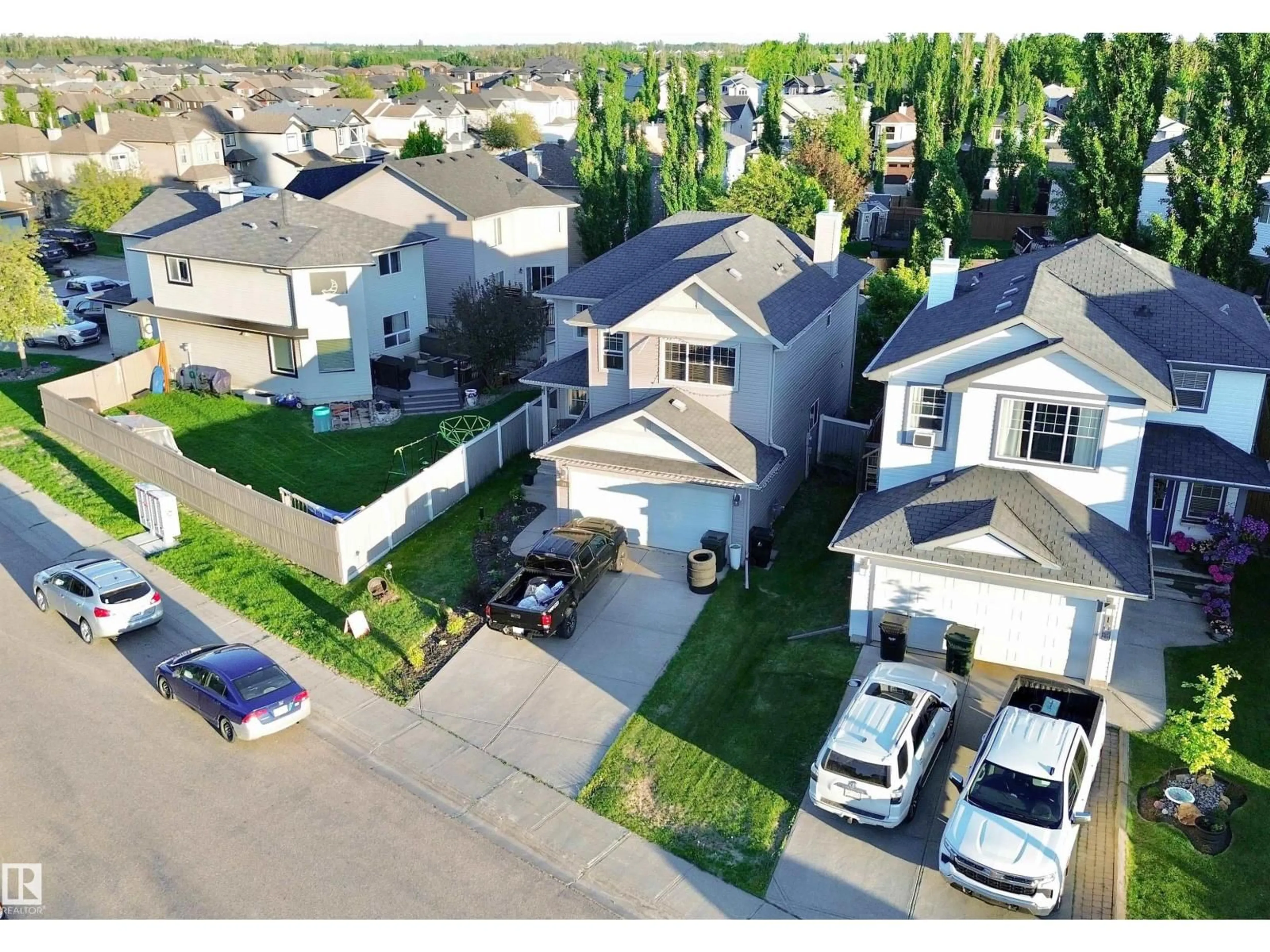 A pic from outside/outdoor area/front of a property/back of a property/a pic from drone, street for 105 GREYSTONE CR, Spruce Grove Alberta T7X0A7