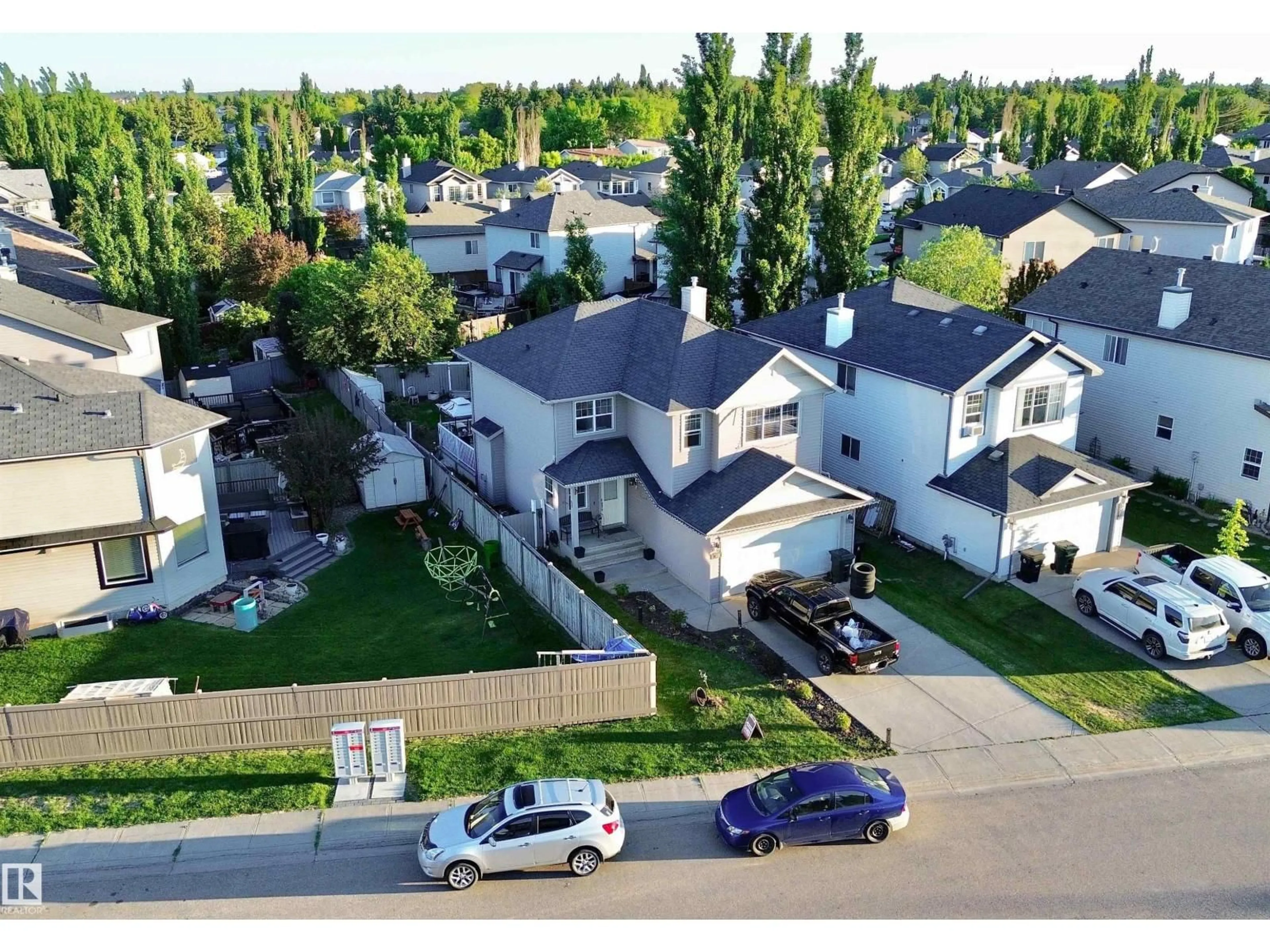 A pic from outside/outdoor area/front of a property/back of a property/a pic from drone, street for 105 GREYSTONE CR, Spruce Grove Alberta T7X0A7
