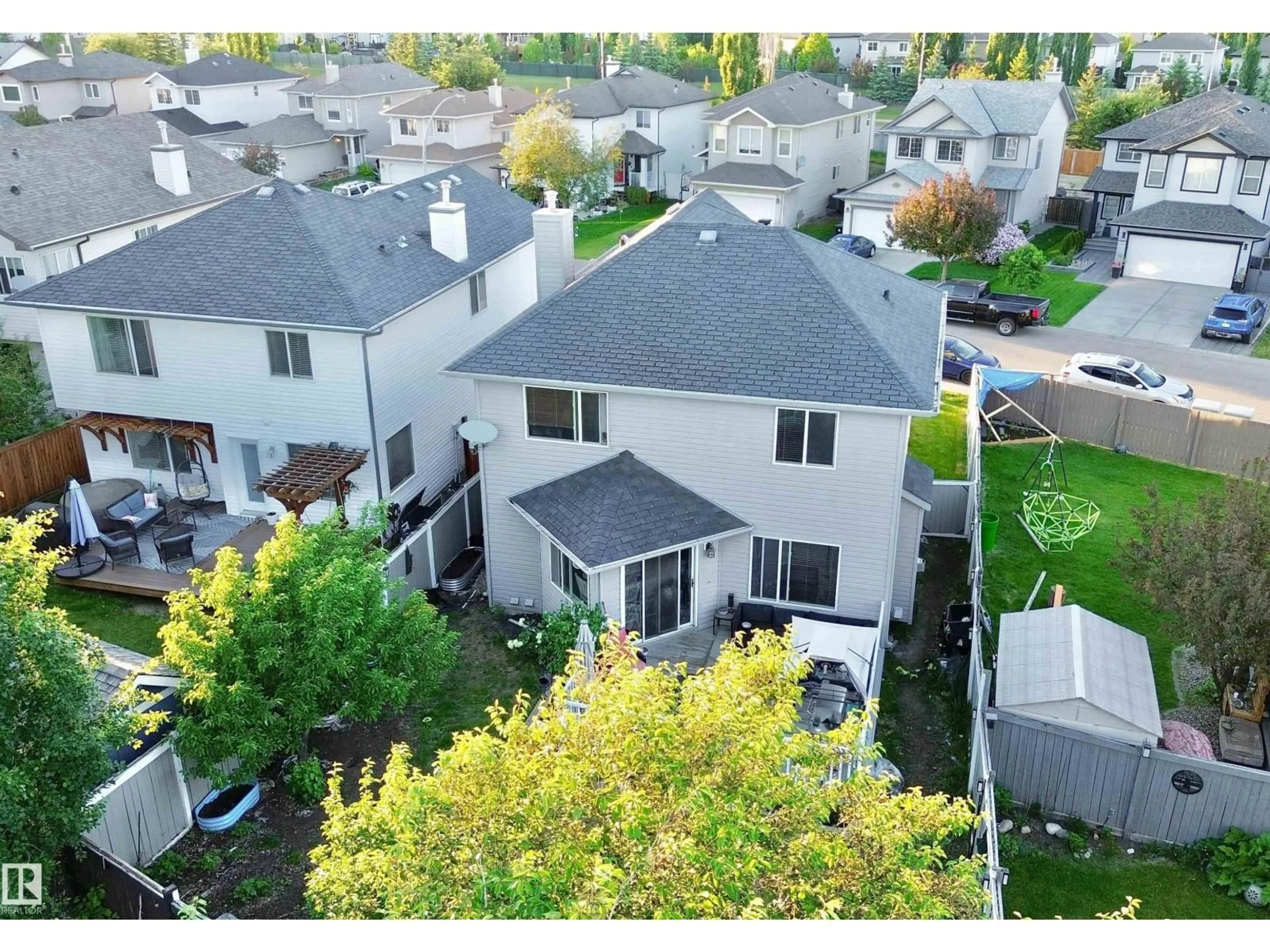 A pic from outside/outdoor area/front of a property/back of a property/a pic from drone, unknown for 105 GREYSTONE CR, Spruce Grove Alberta T7X0A7