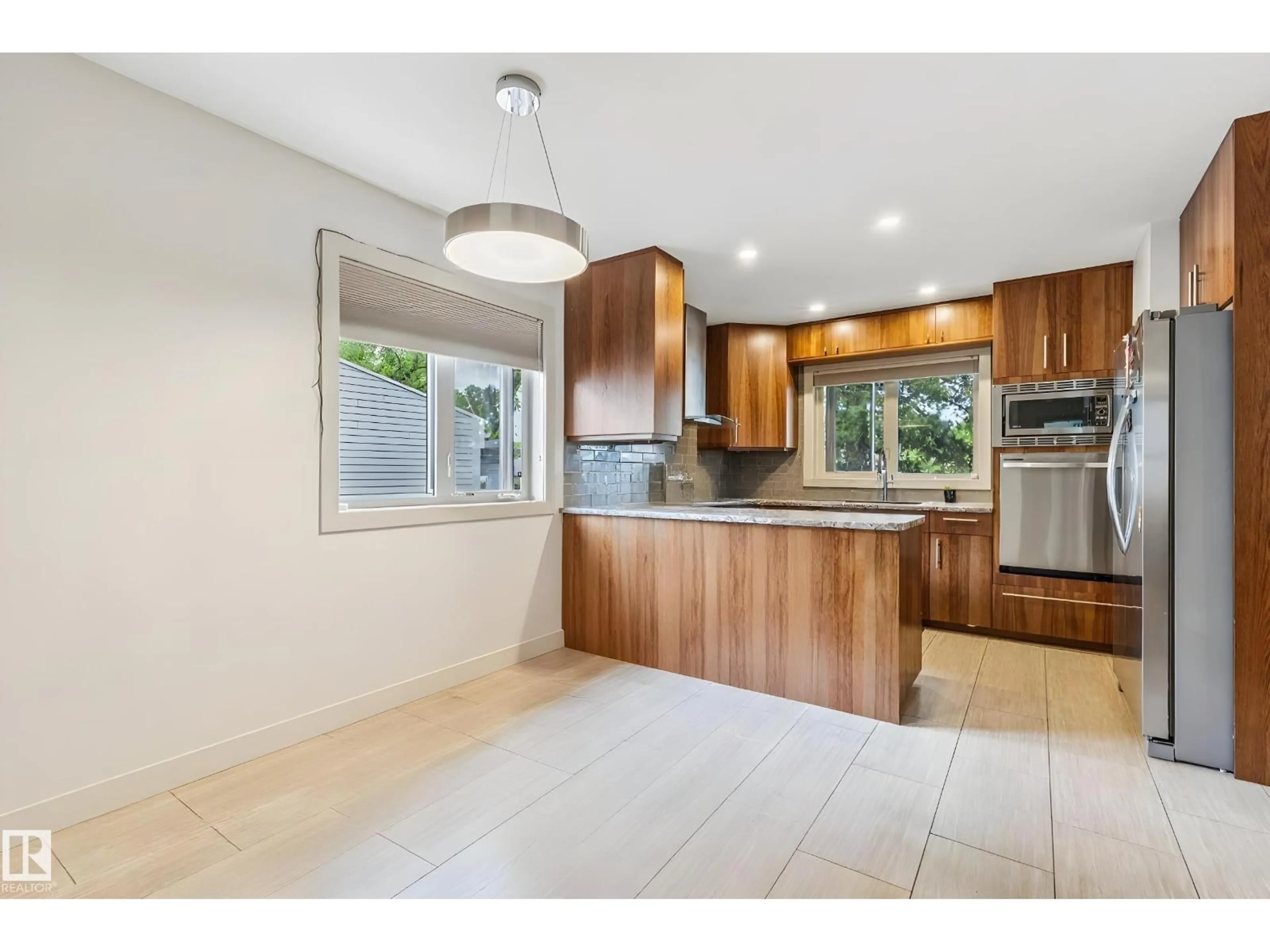 Open concept kitchen, ceramic/tile floor for NW - 12929/31 103 ST, Edmonton Alberta T5E4M2