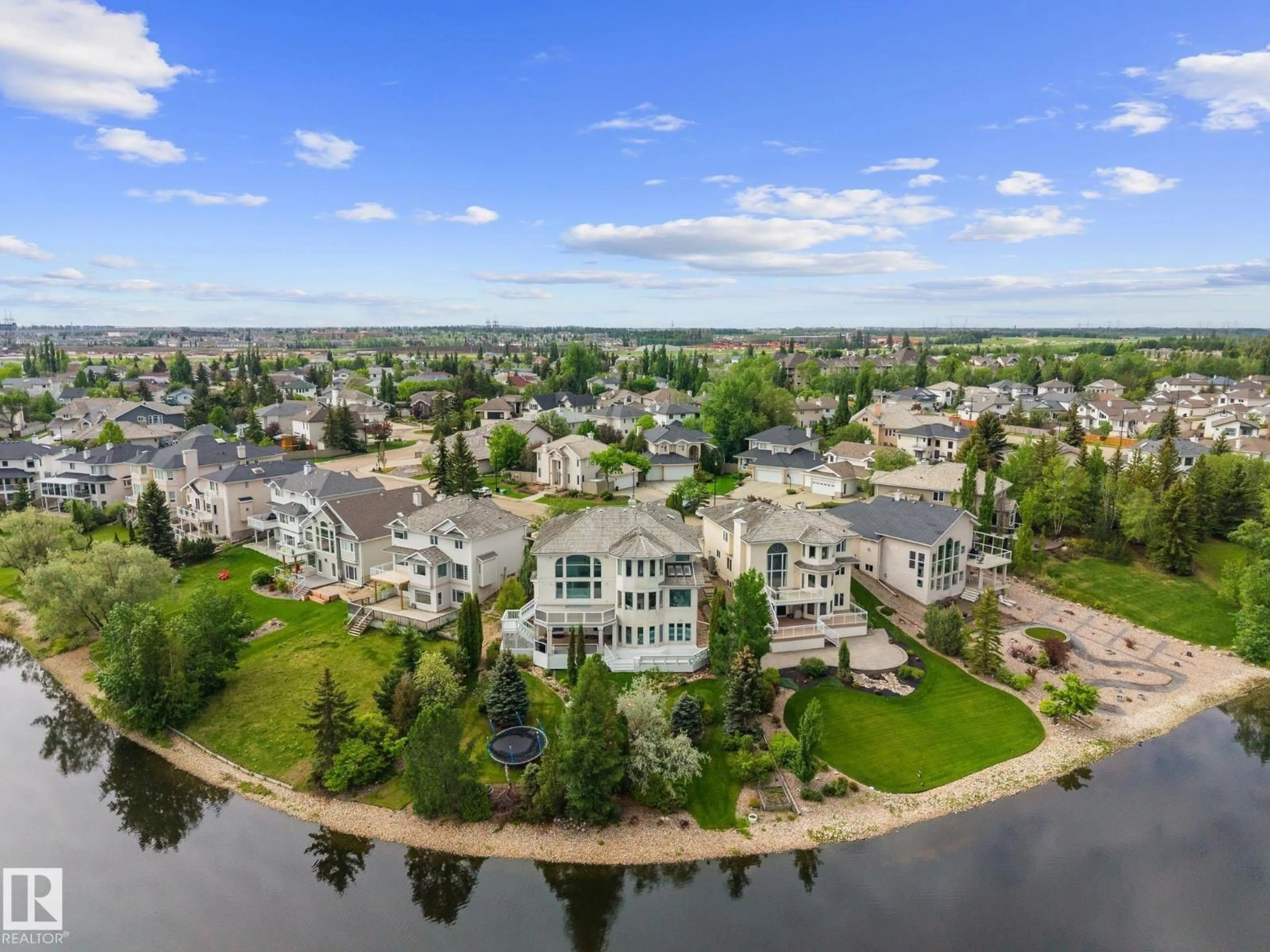 A pic from outside/outdoor area/front of a property/back of a property/a pic from drone, water/lake/river/ocean view for 138 TWIN BROOKS COVE CV, Edmonton Alberta T6J6Y2