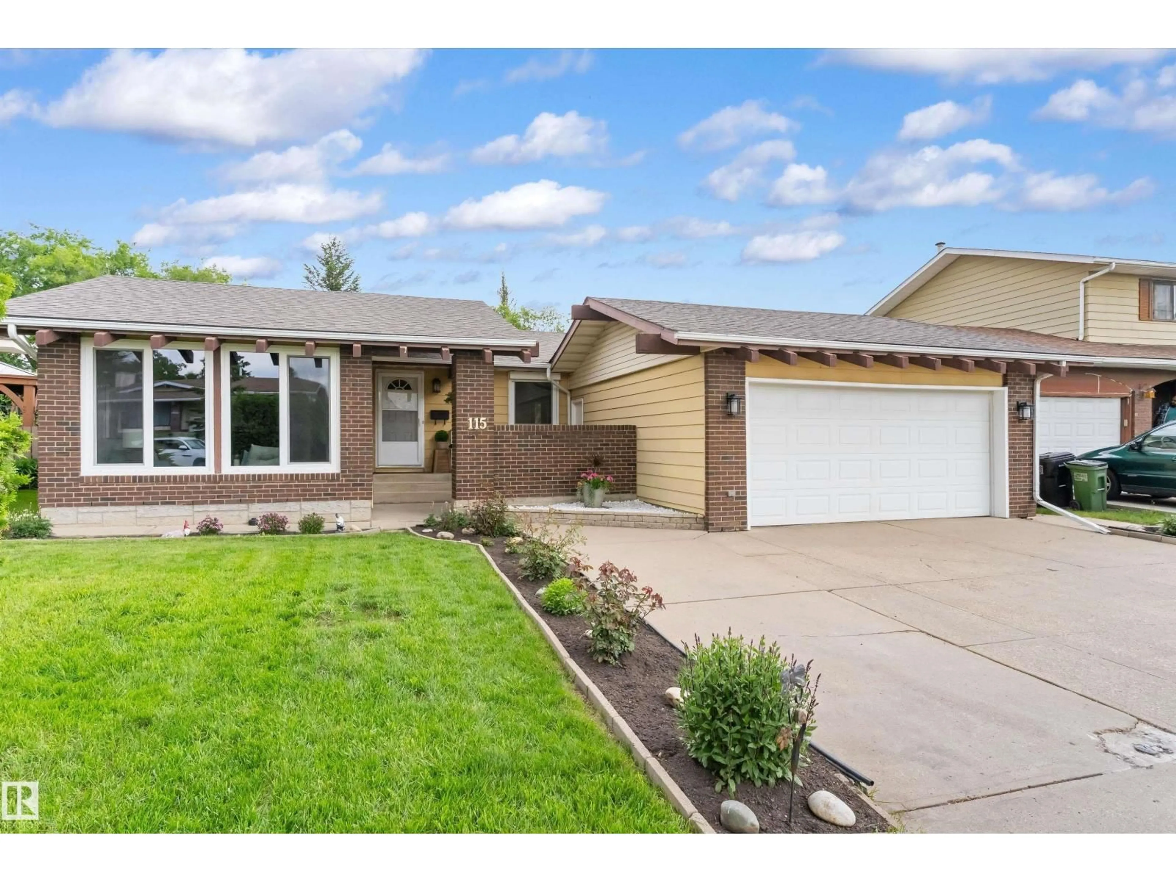 Home with vinyl exterior material, street for 115 HARRISON DR, Edmonton Alberta T5A2M6