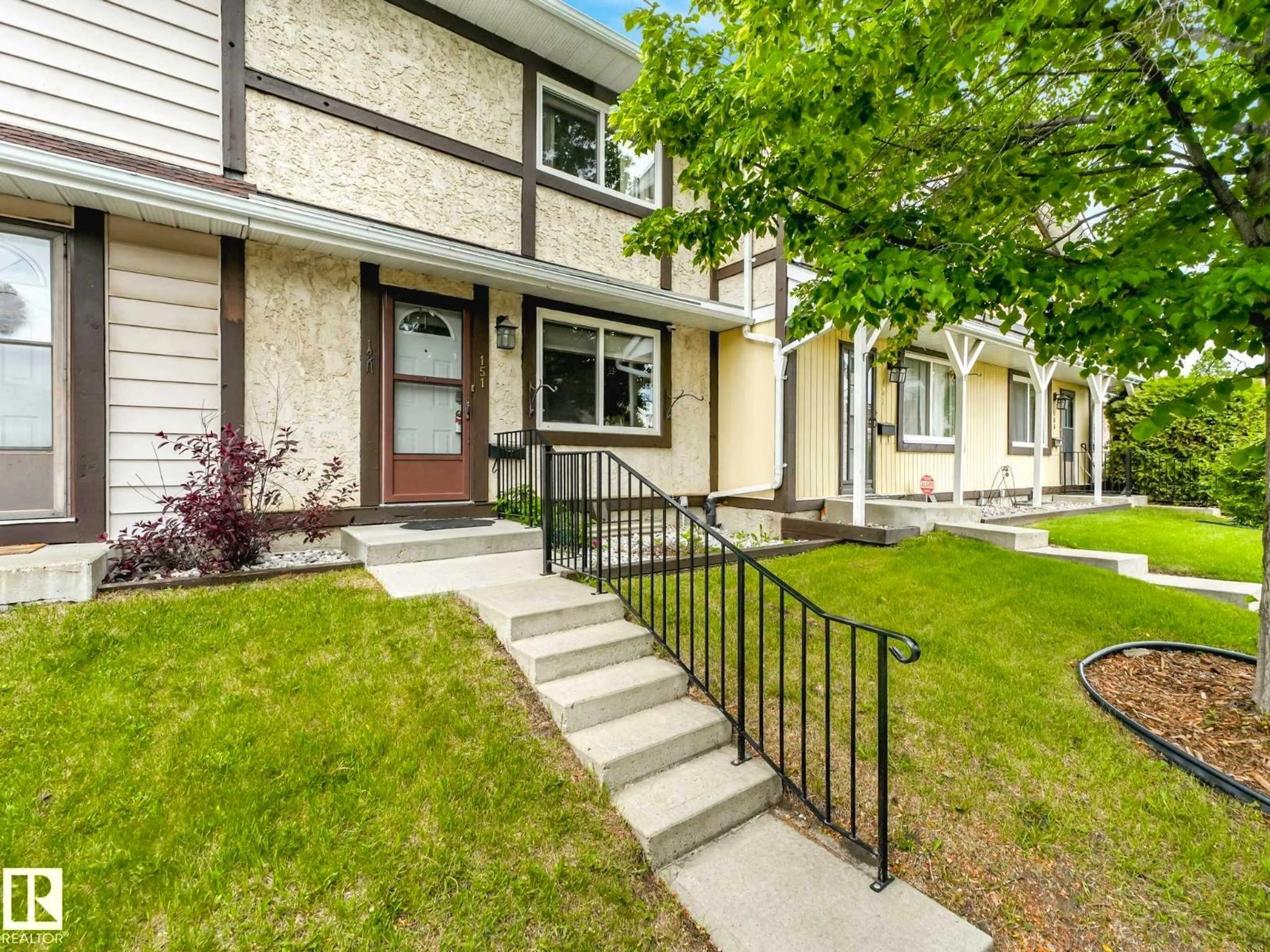 Home with vinyl exterior material, street for 151 TUDOR LN, Edmonton Alberta T5J3T5
