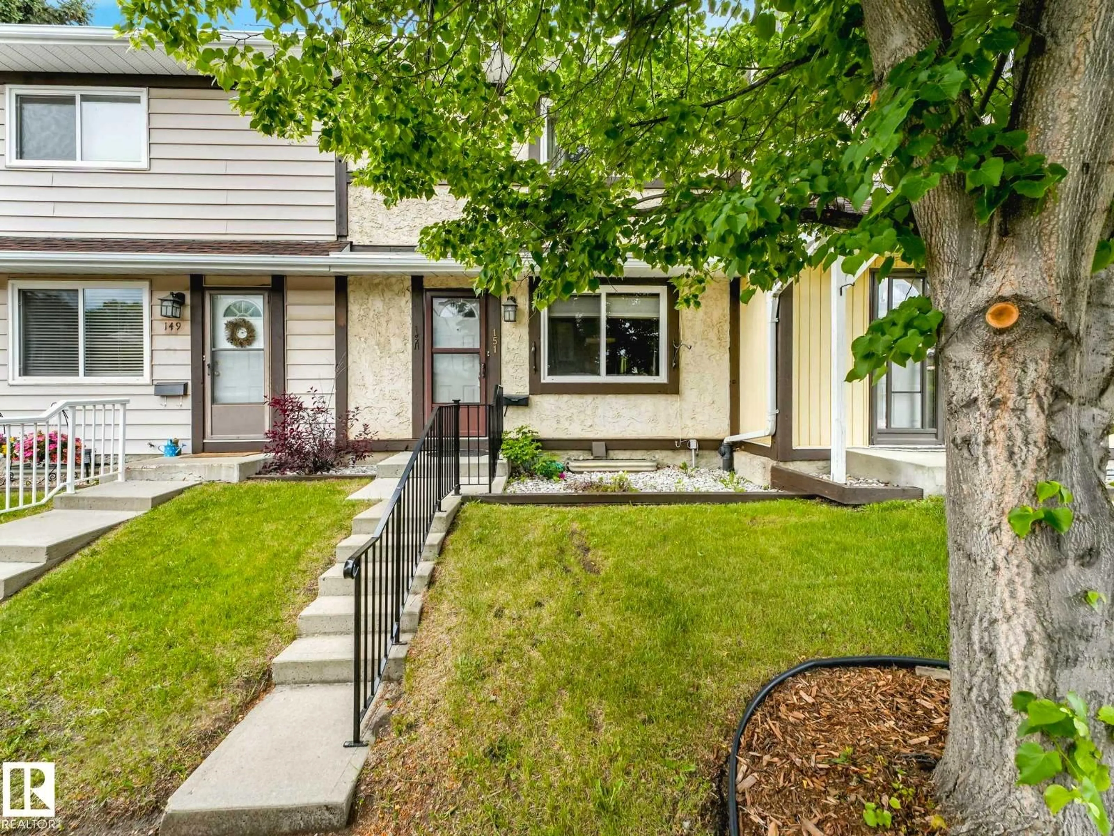 Home with vinyl exterior material, street for 151 TUDOR LN, Edmonton Alberta T5J3T5