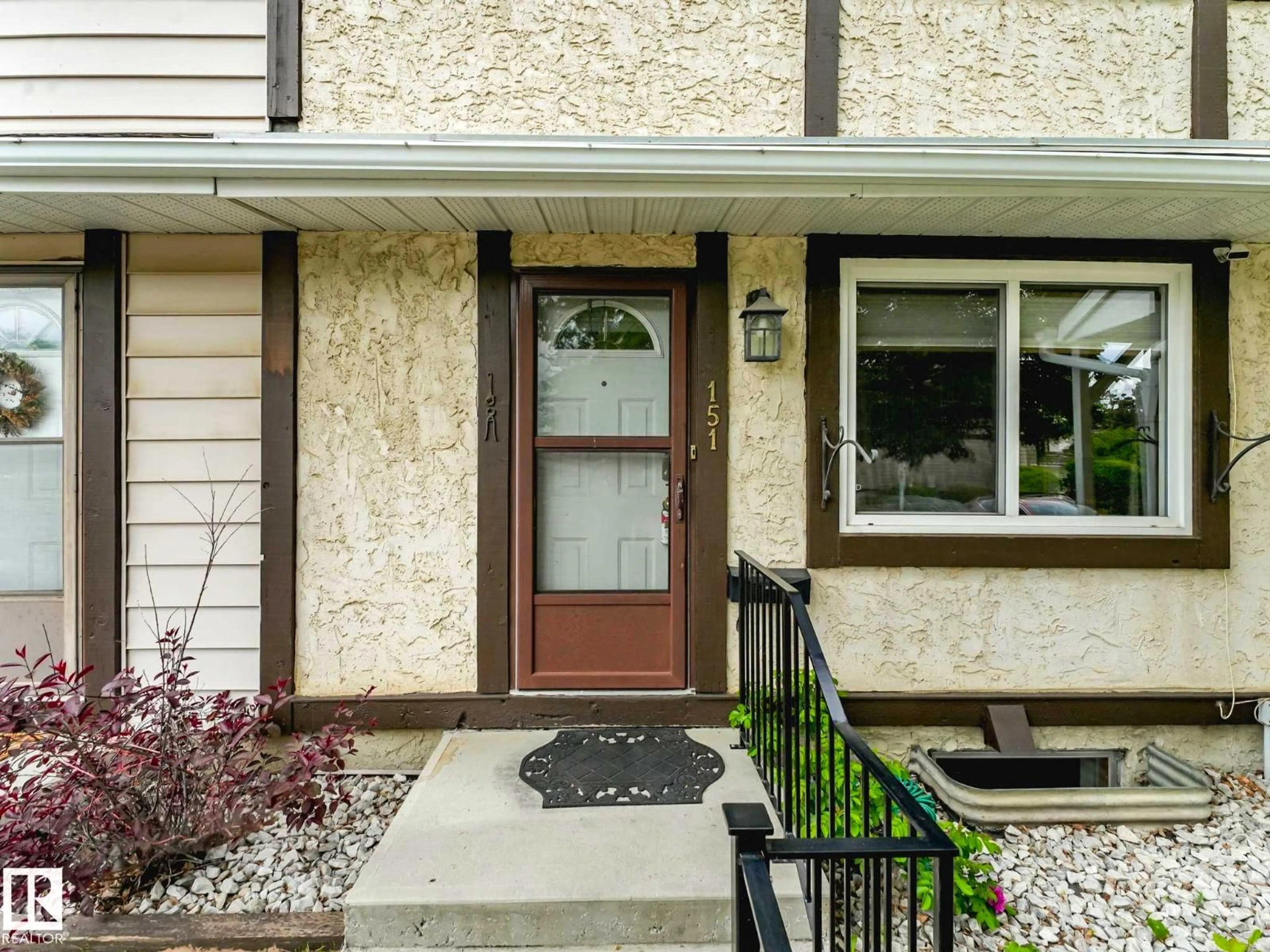 Home with vinyl exterior material, street for 151 TUDOR LN, Edmonton Alberta T5J3T5