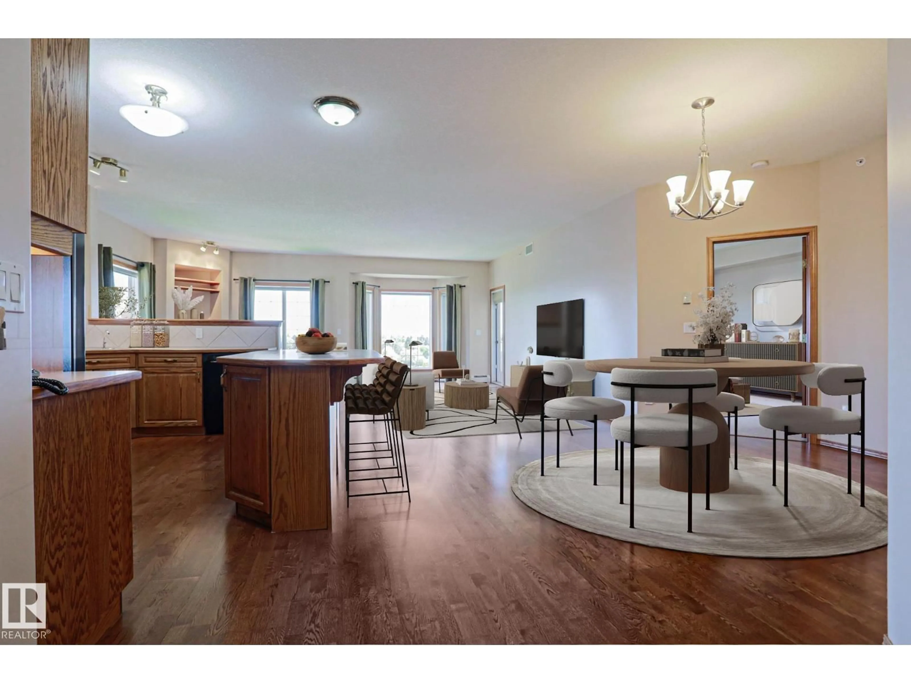 Open concept kitchen, wood/laminate floor for #406 - 11260 153 AV, Edmonton Alberta T5X6E7
