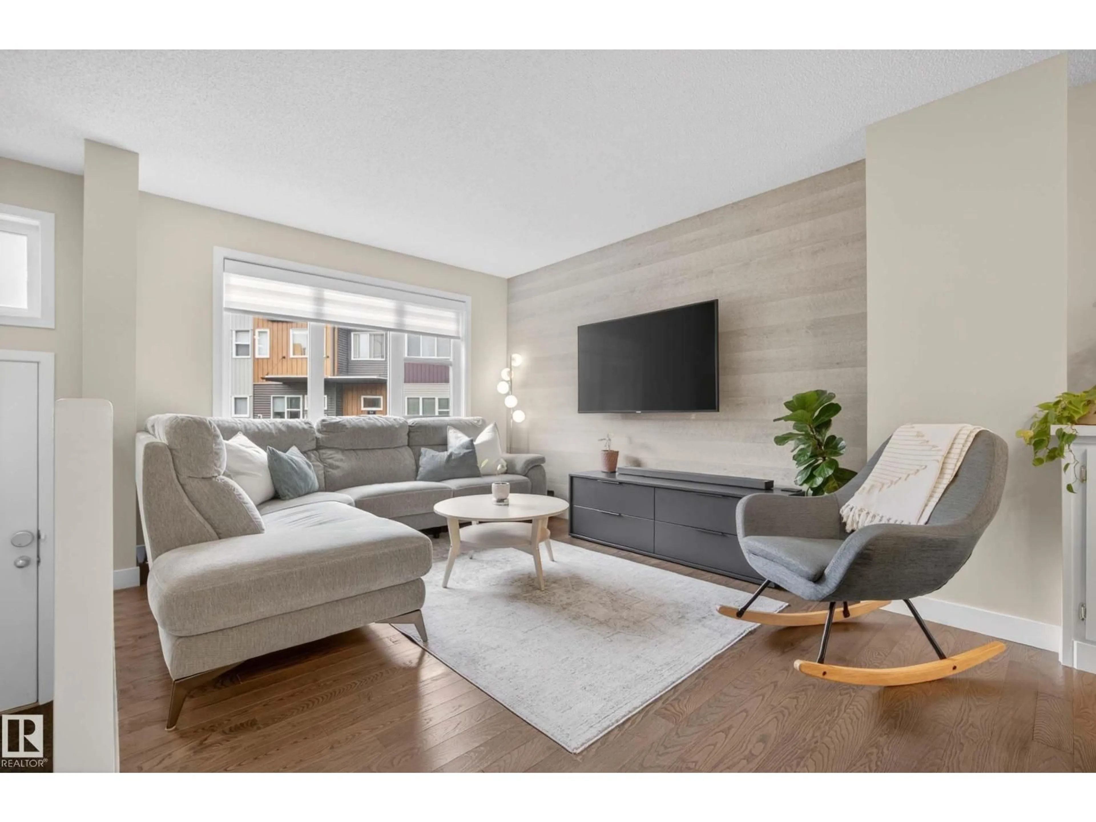 Living room with furniture, wood/laminate floor for #71 - 4470 PROWSE RD, Edmonton Alberta T6W3R5