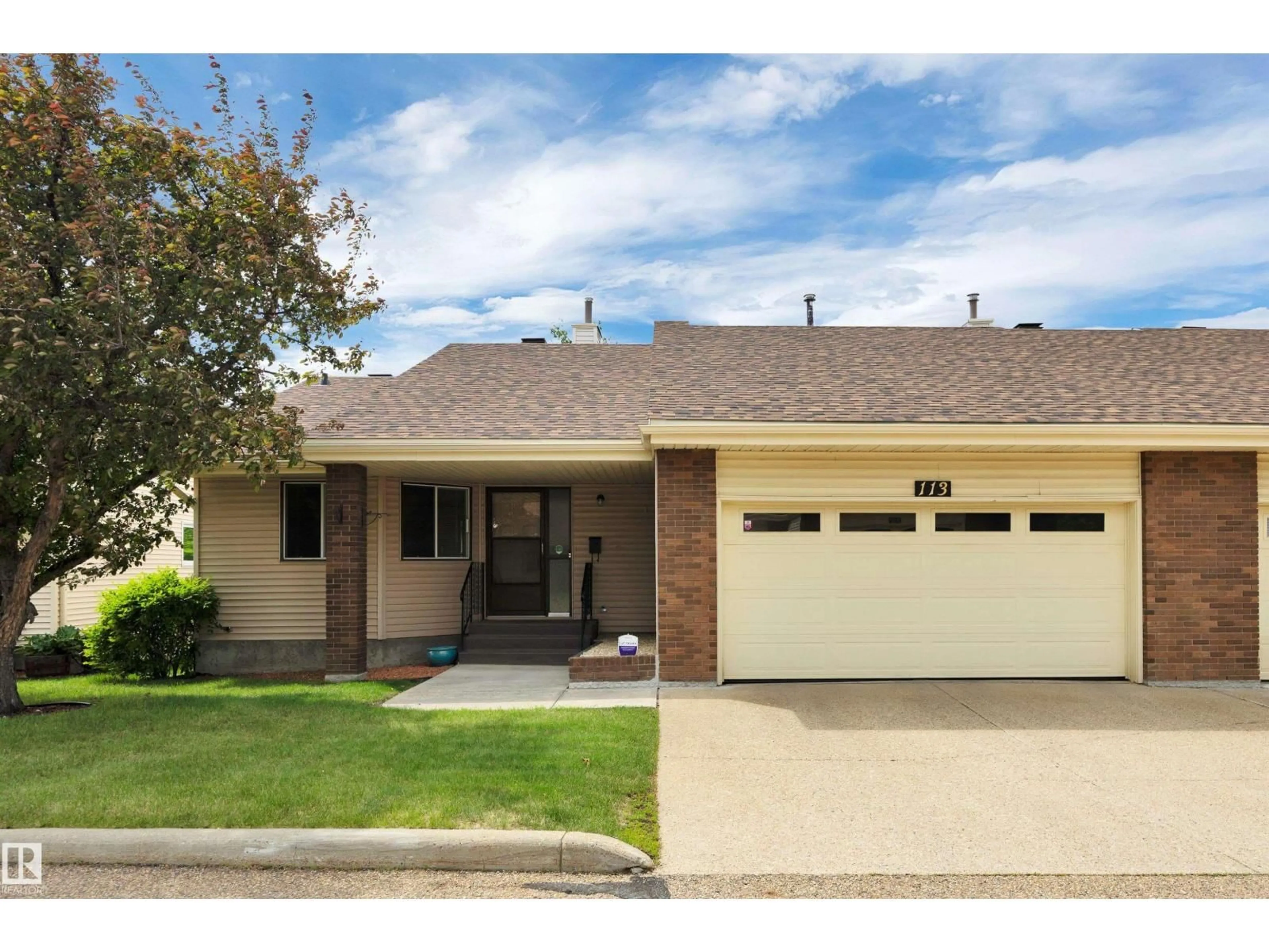 Home with vinyl exterior material, street for 113 OEMING RD, Edmonton Alberta T6R1L9