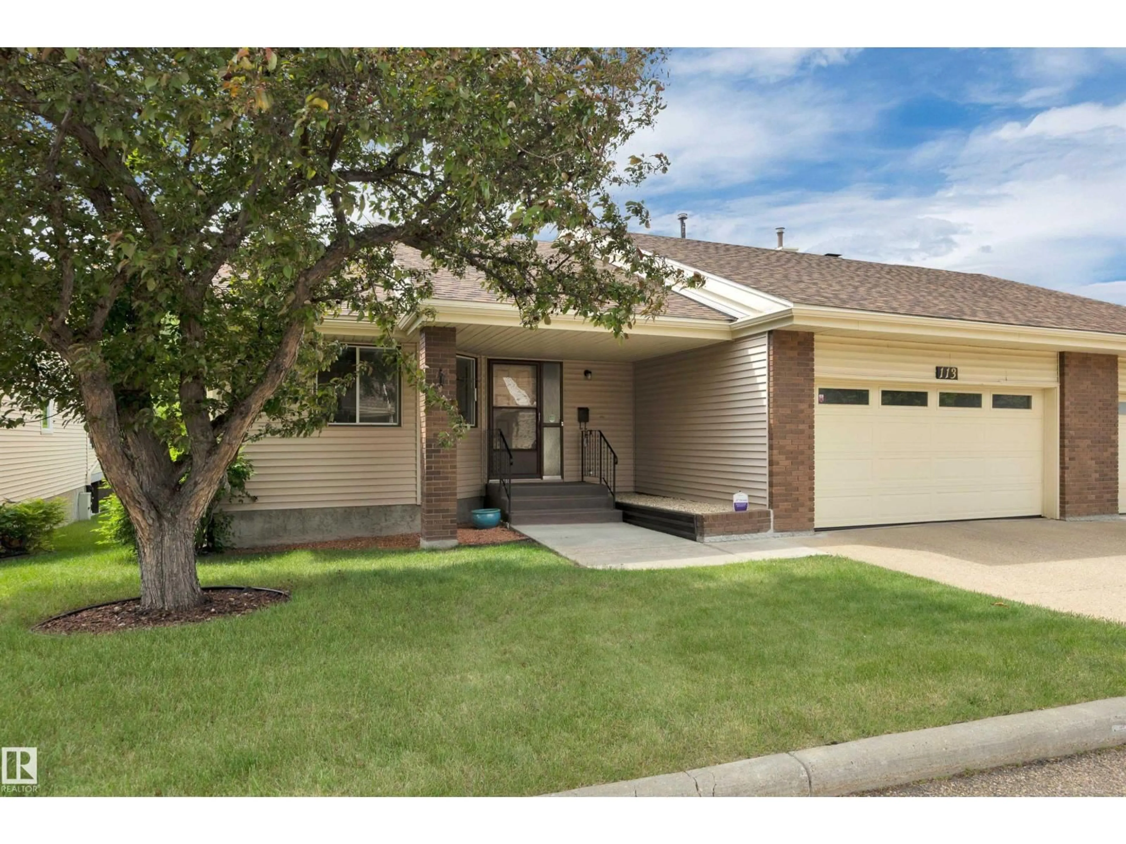 Home with vinyl exterior material, street for 113 OEMING RD, Edmonton Alberta T6R1L9