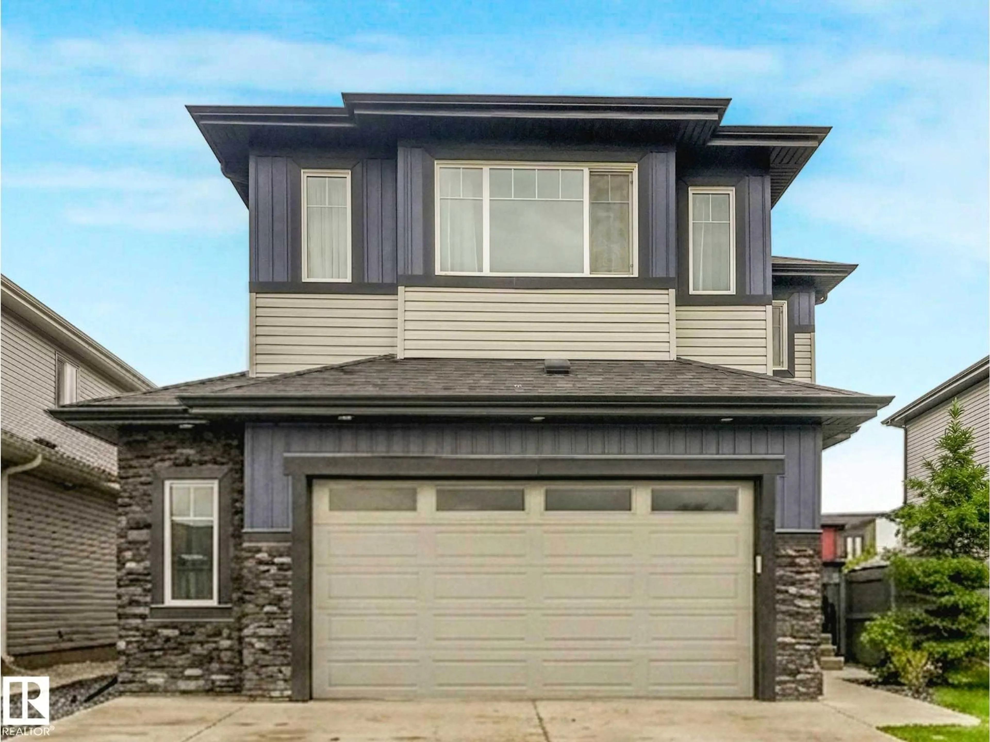 Home with vinyl exterior material, street for 322 WEST HAVEN DR, Leduc Alberta T9E1B6