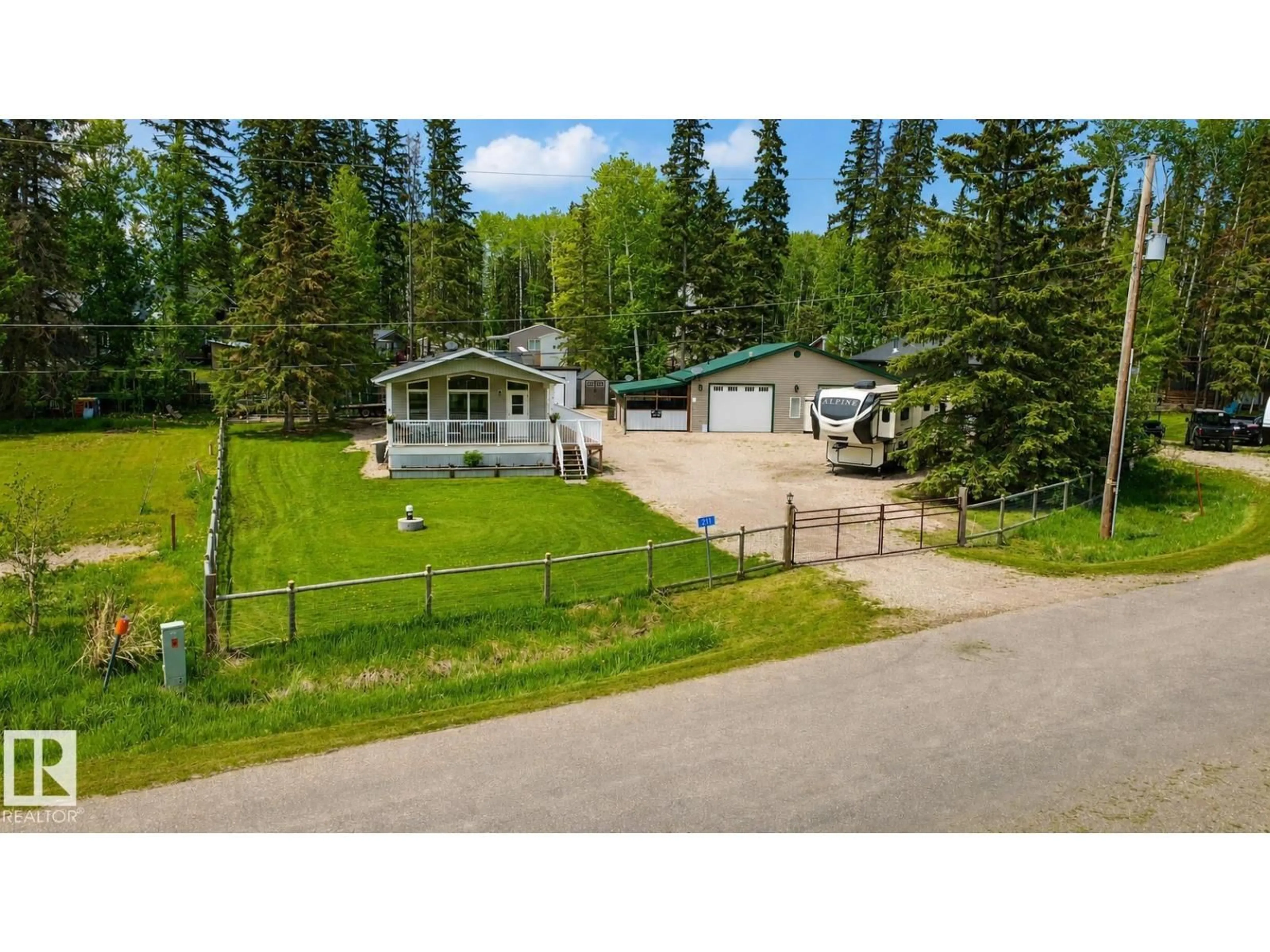 A pic from outside/outdoor area/front of a property/back of a property/a pic from drone, unknown for 211 LABONTE DR, Rural Athabasca County Alberta T0A0M0
