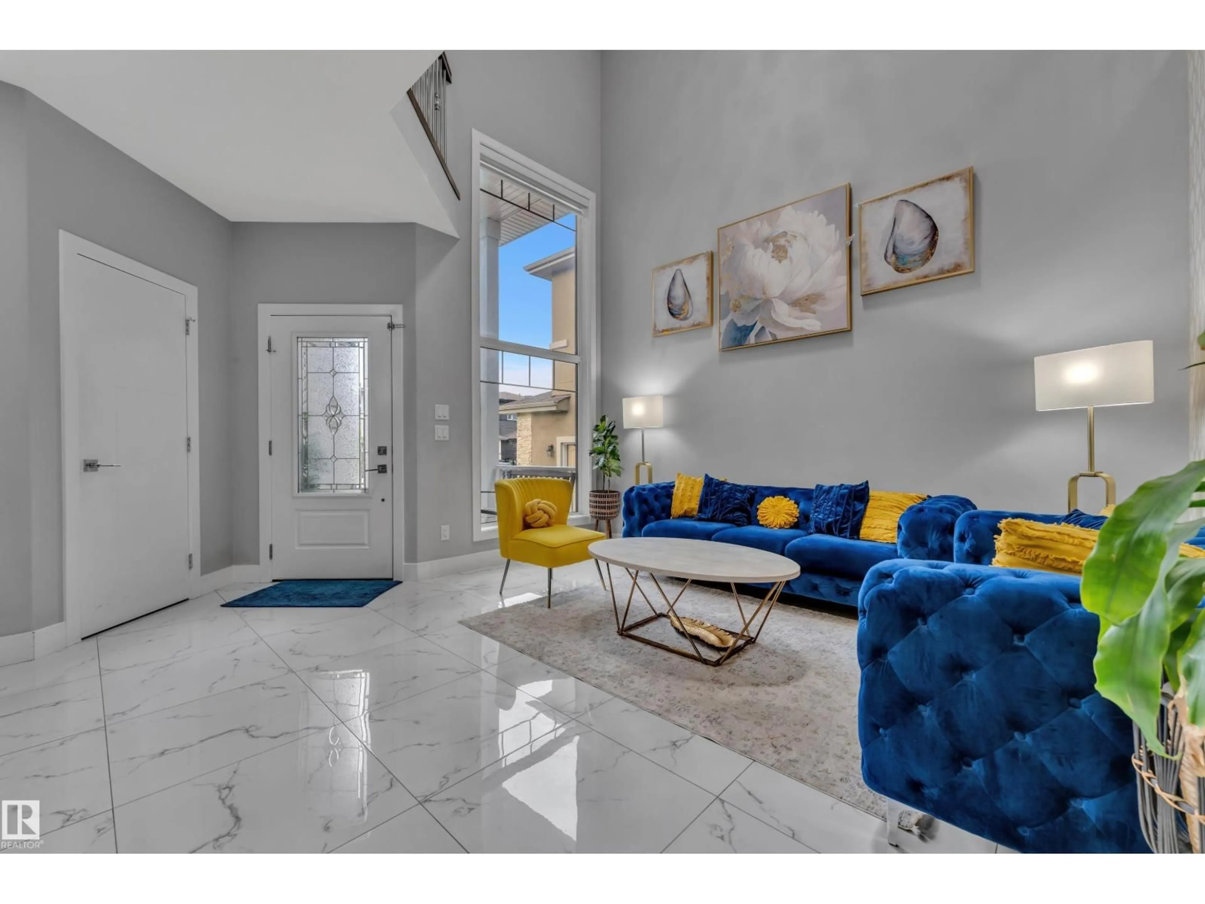 Living room with furniture, ceramic/tile floor for 2419 15 AV, Edmonton Alberta T6T2L3