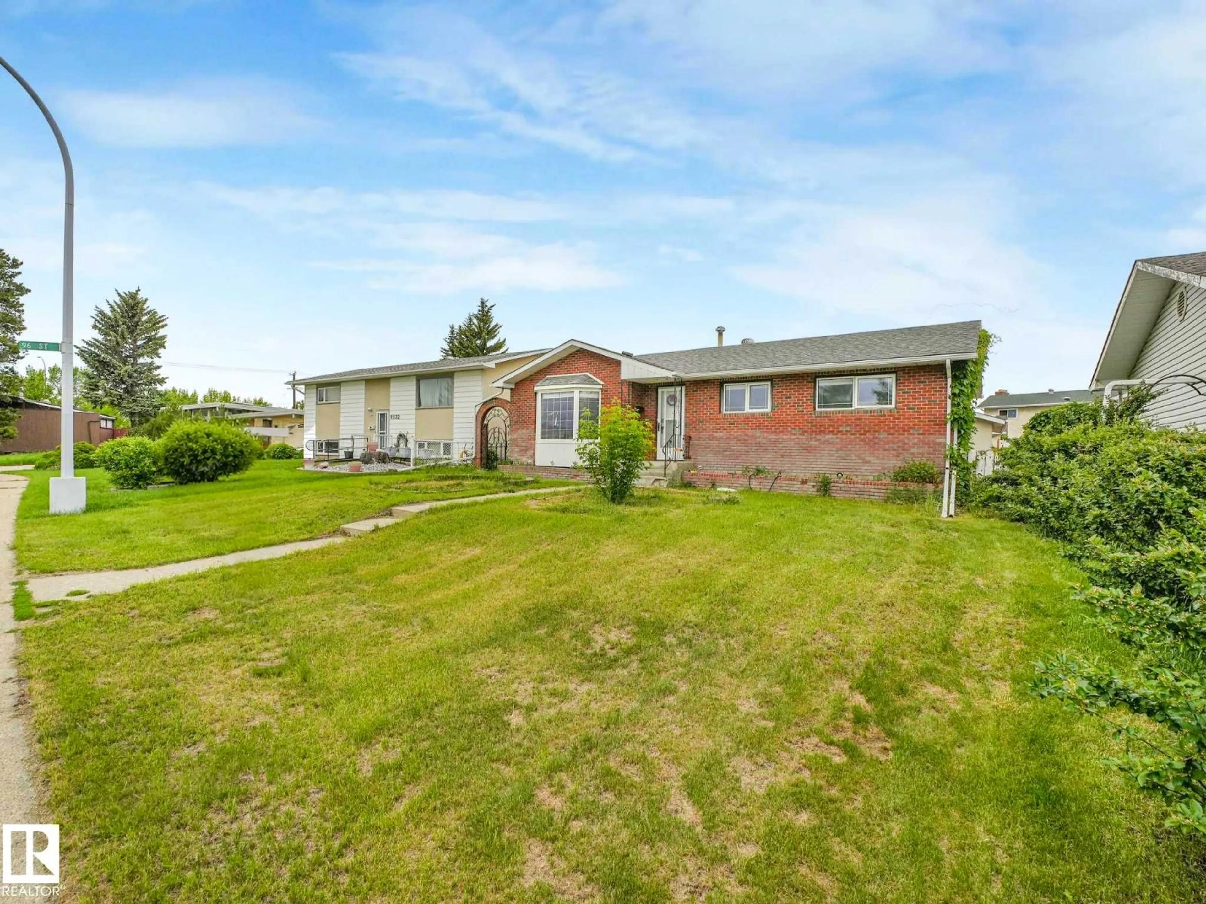 A pic from outside/outdoor area/front of a property/back of a property/a pic from drone, street for 9528 151 AV, Edmonton Alberta T5E2R3