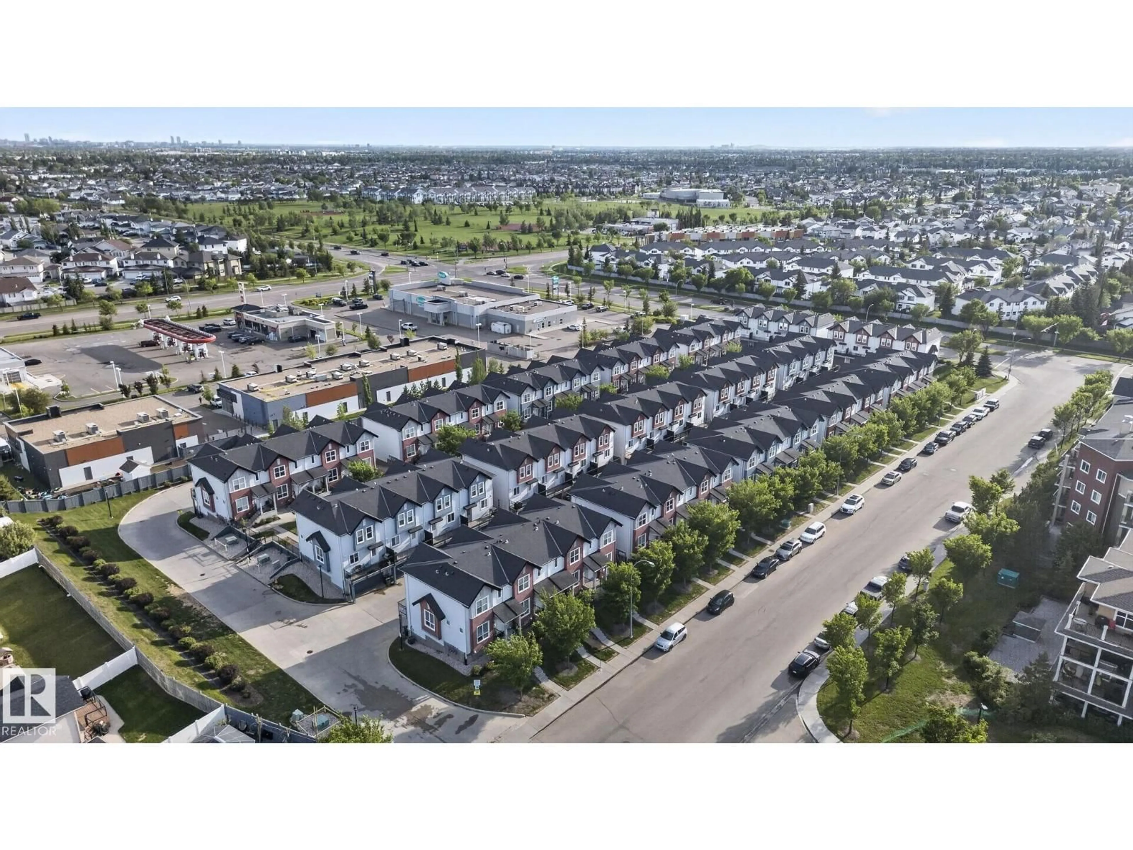 A pic from outside/outdoor area/front of a property/back of a property/a pic from drone, street for 30 6075 SCHONSEE WY NW, Edmonton Alberta T5Z0H4