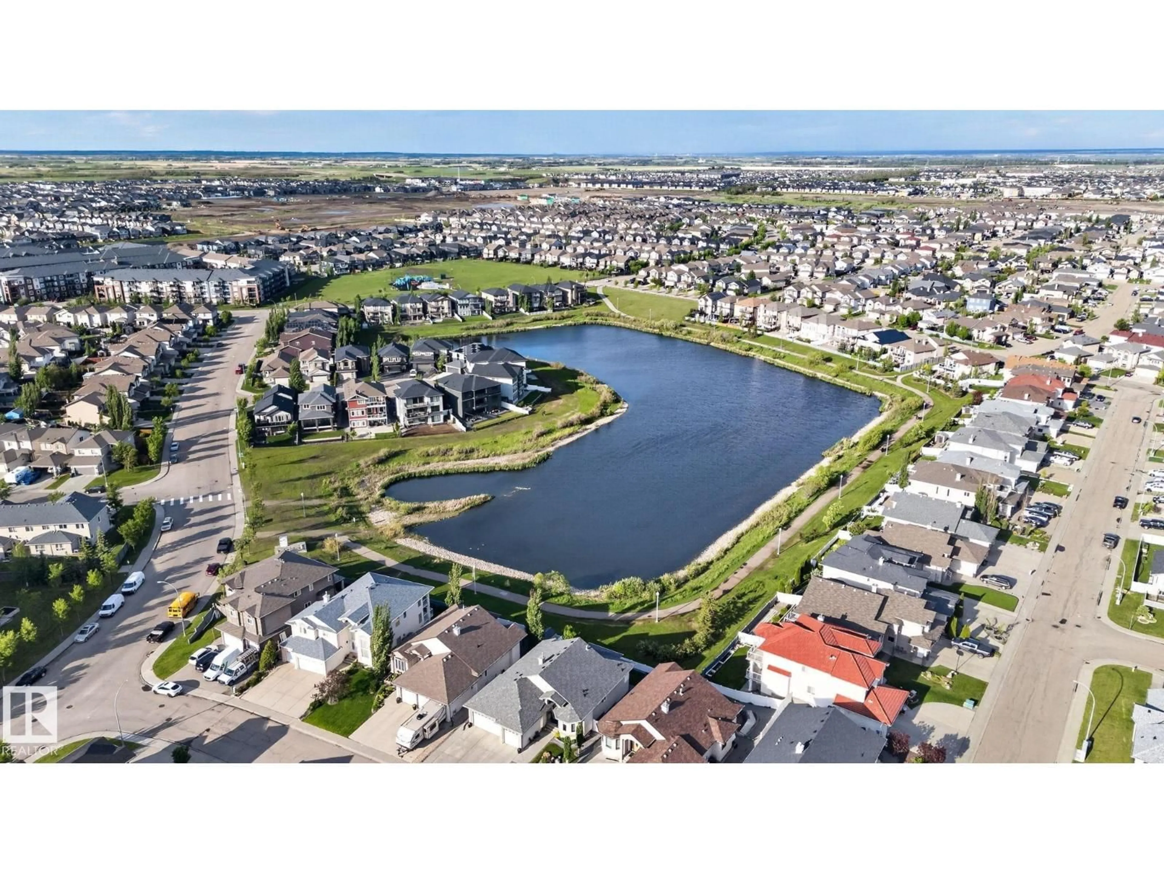 A pic from outside/outdoor area/front of a property/back of a property/a pic from drone, water/lake/river/ocean view for 30 6075 SCHONSEE WY NW, Edmonton Alberta T5Z0H4