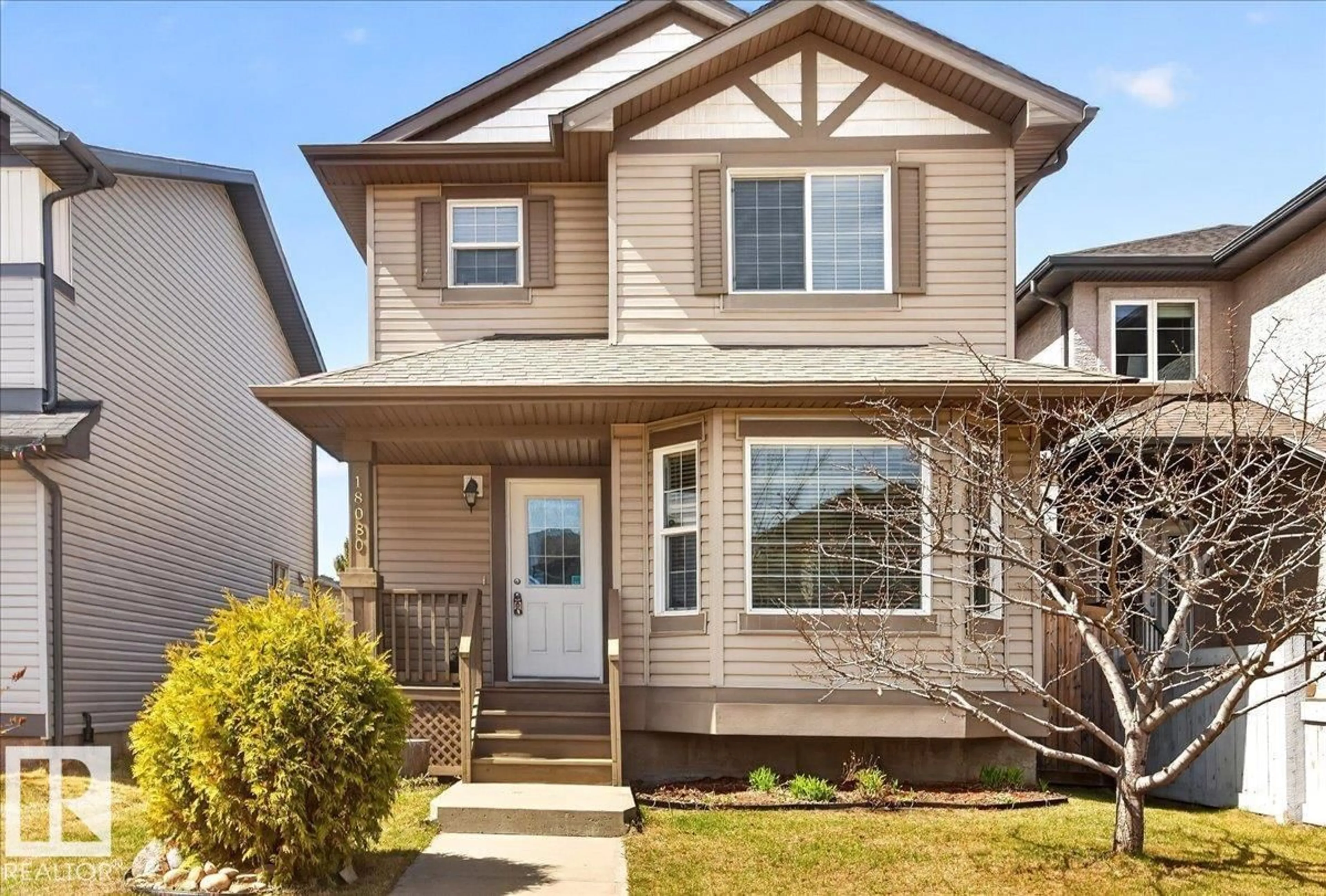 Home with vinyl exterior material, street for 18080 89 ST, Edmonton Alberta T5Z0J5