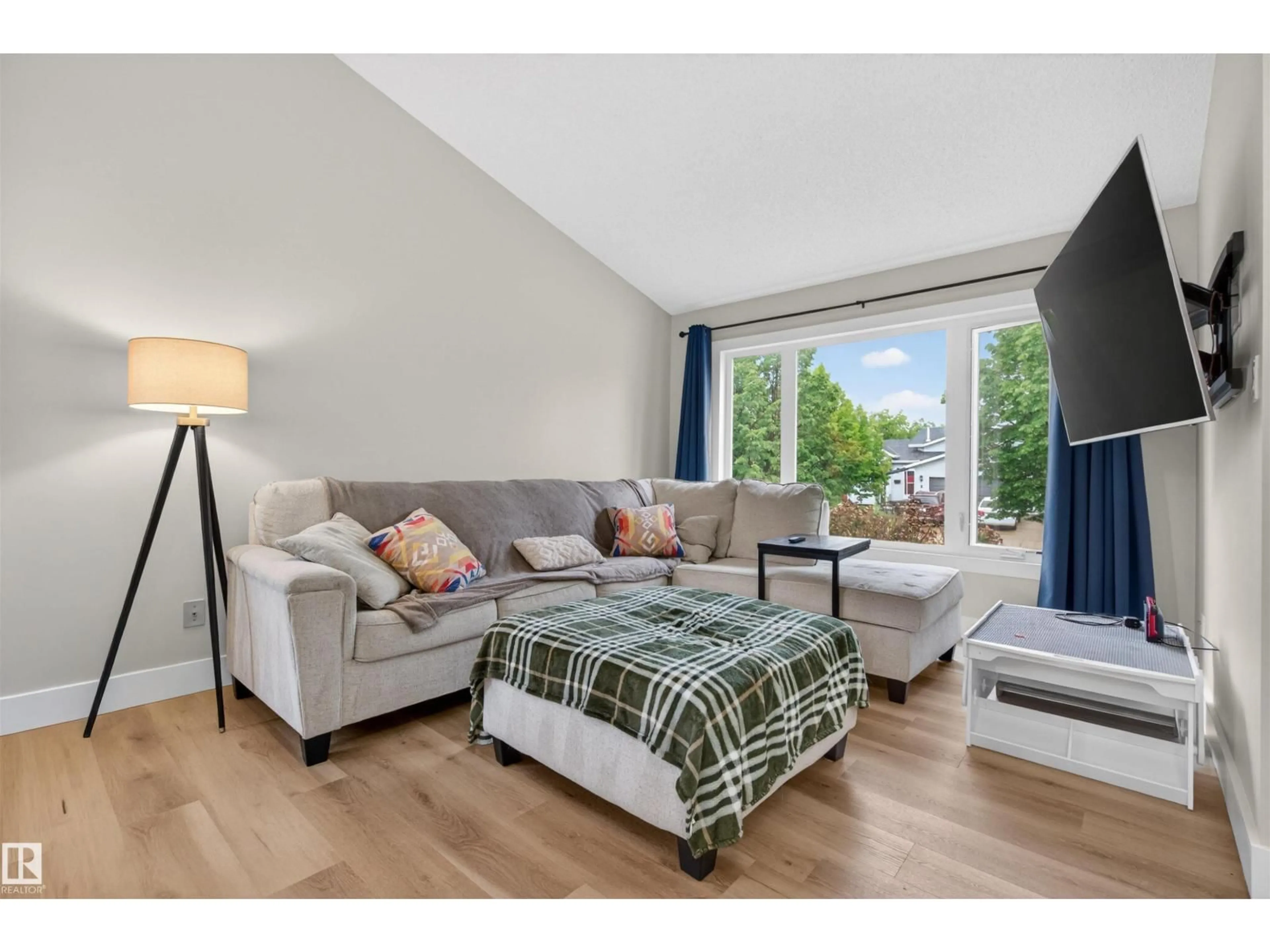 Living room with furniture, wood/laminate floor for 13 DANBRIDGE PL, St. Albert Alberta T8N4V5