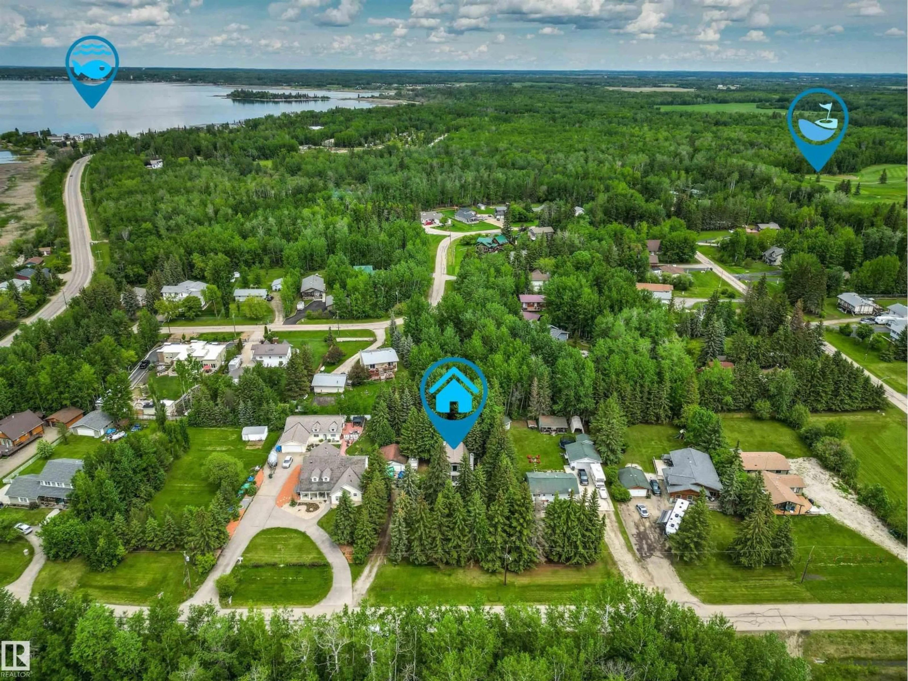 A pic from outside/outdoor area/front of a property/back of a property/a pic from drone, water/lake/river/ocean view for 4820 48A AV, Rural Lac Ste. Anne County Alberta T0E0A0