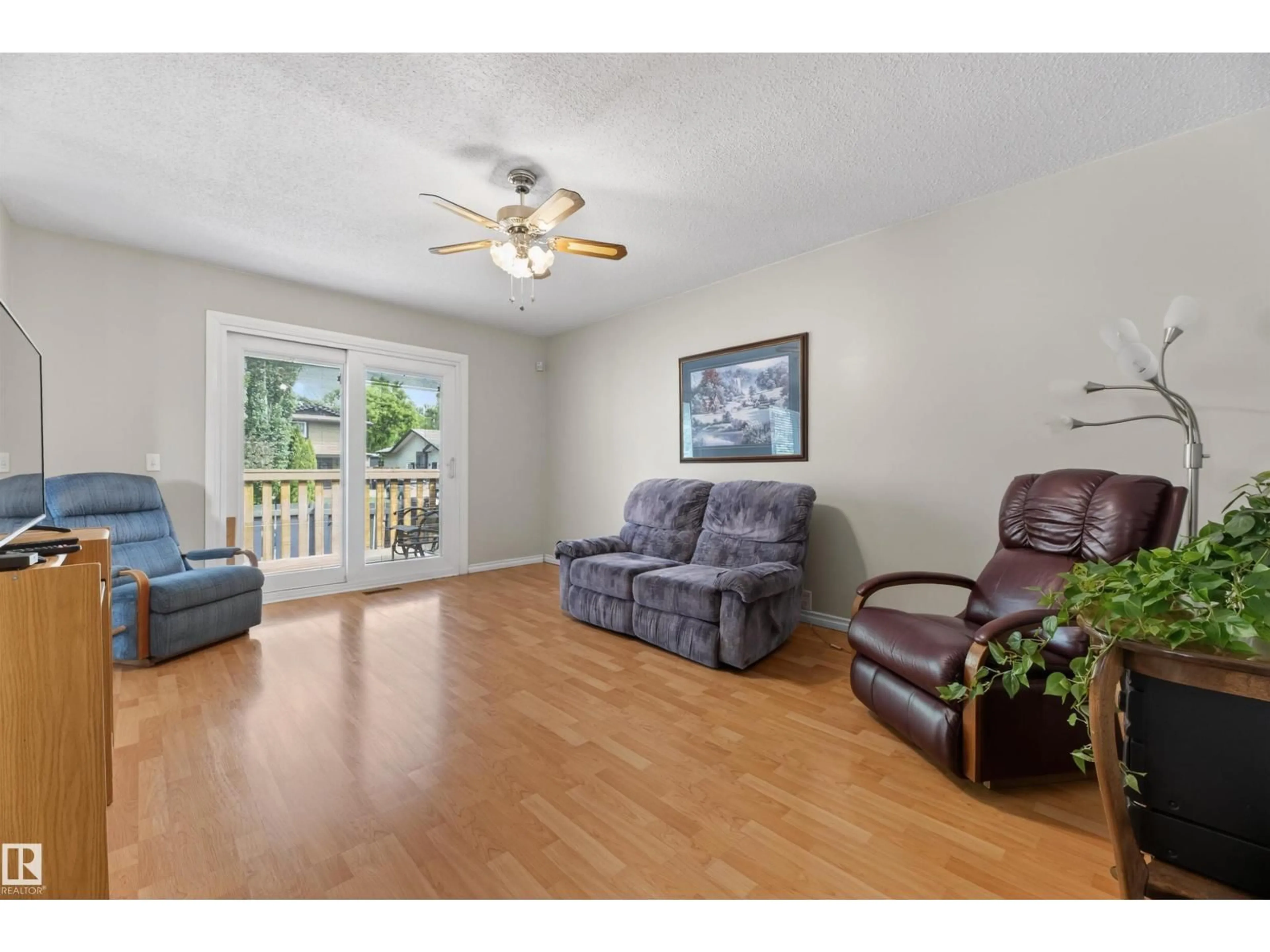 Living room with furniture, wood/laminate floor for 256 WOODBRIDGE WY, Sherwood Park Alberta T8A3Y3