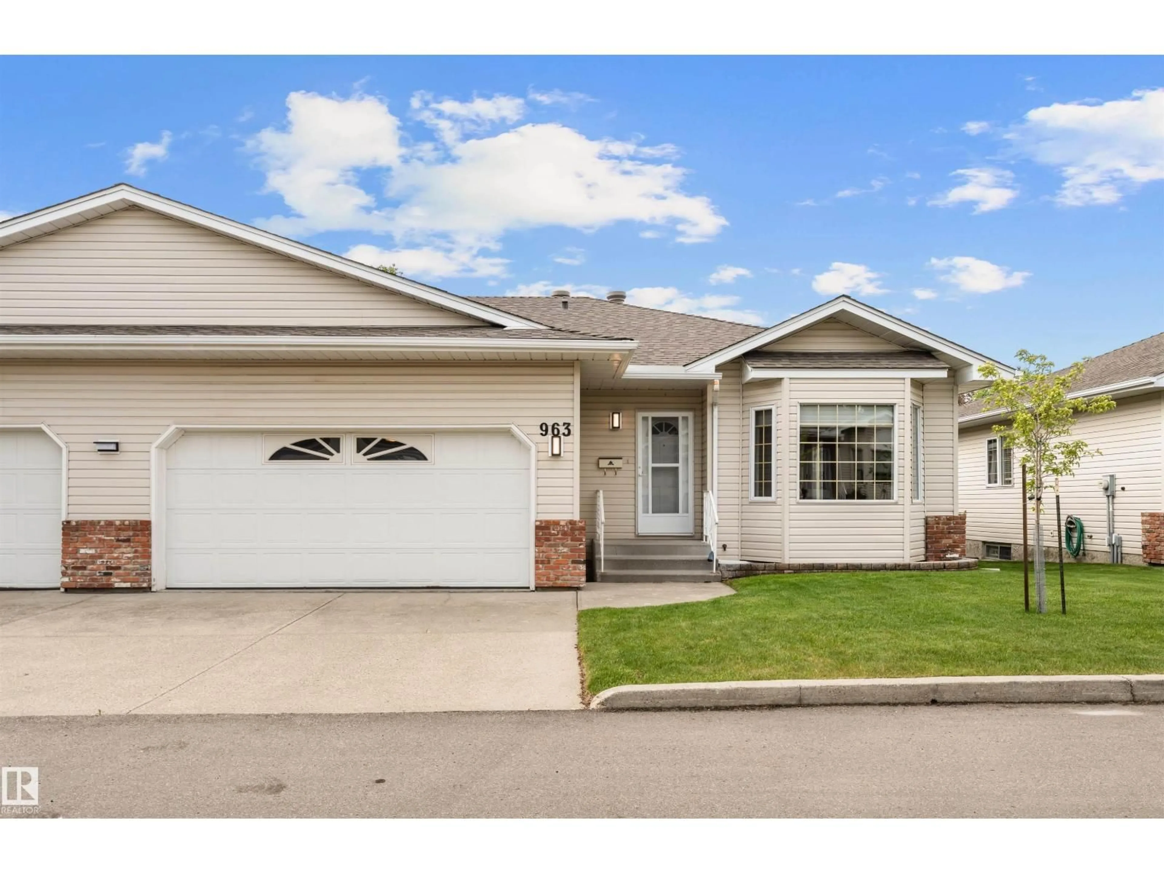 Home with vinyl exterior material, street for 963 YOUVILLE DR W NW, Edmonton Alberta T6L6T2