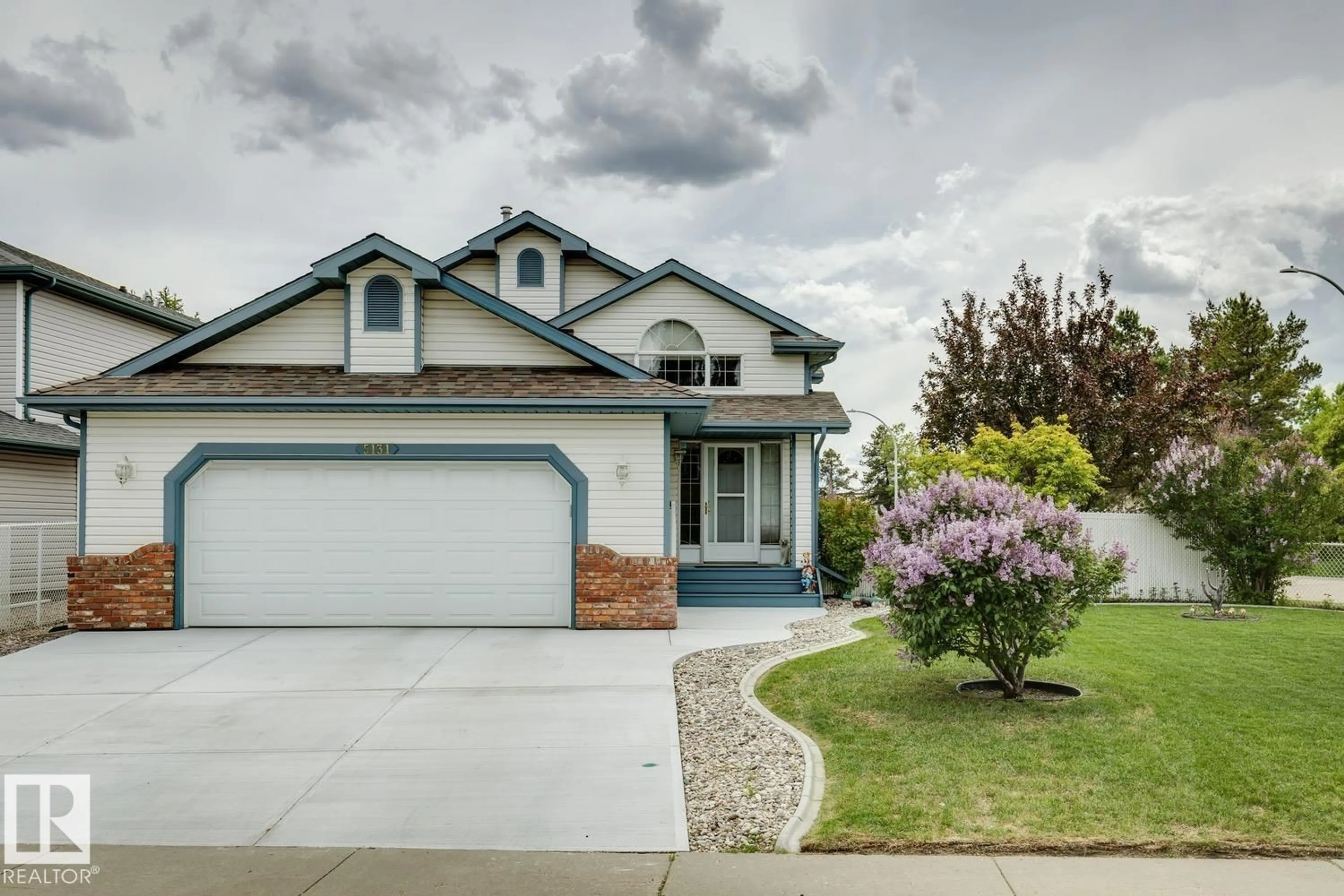 Home with vinyl exterior material, street for 5131 152A AV, Edmonton Alberta T5A5E6