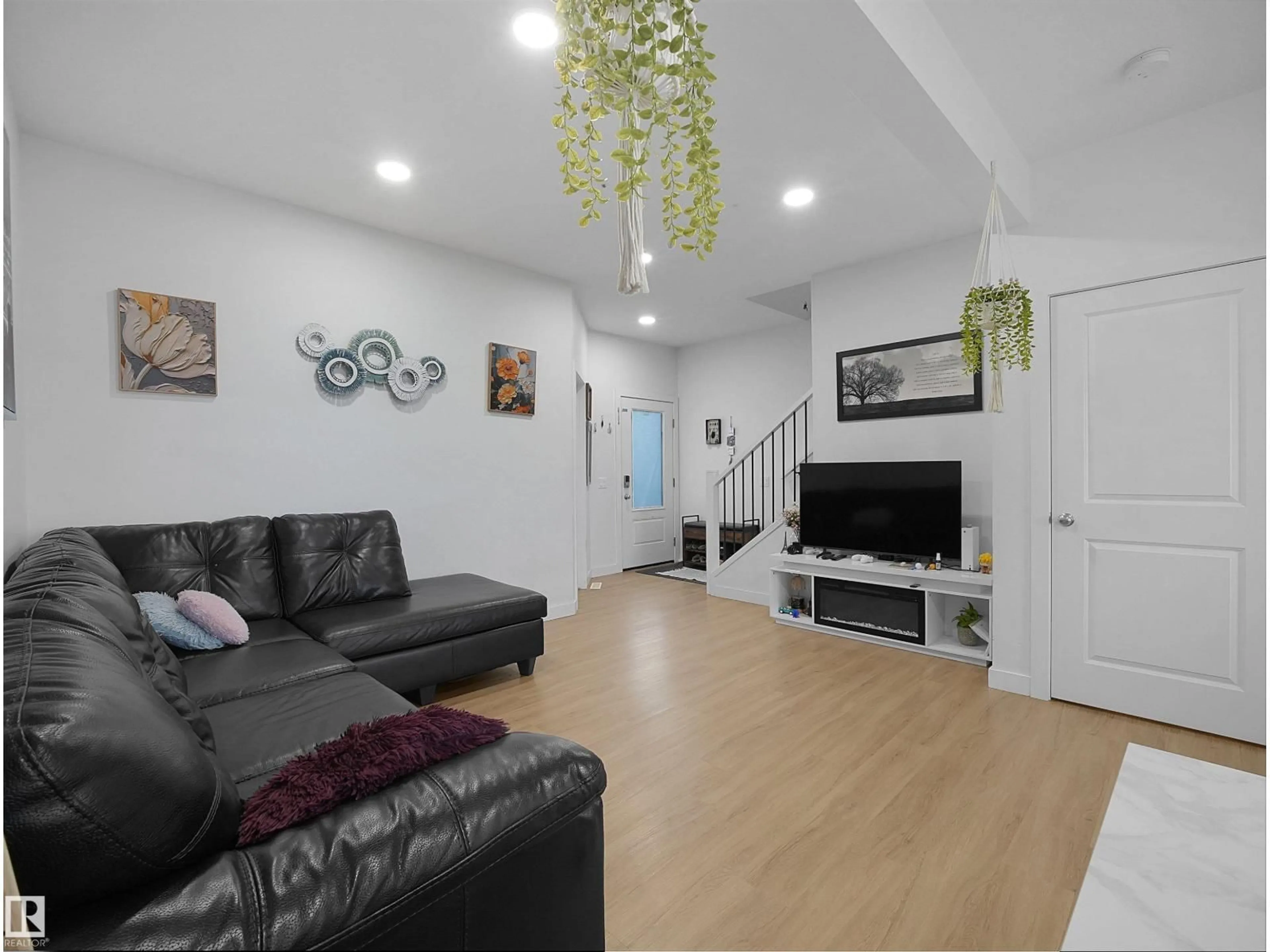 Living room with furniture, unknown for 19316 29 AV, Edmonton Alberta T6M3B2