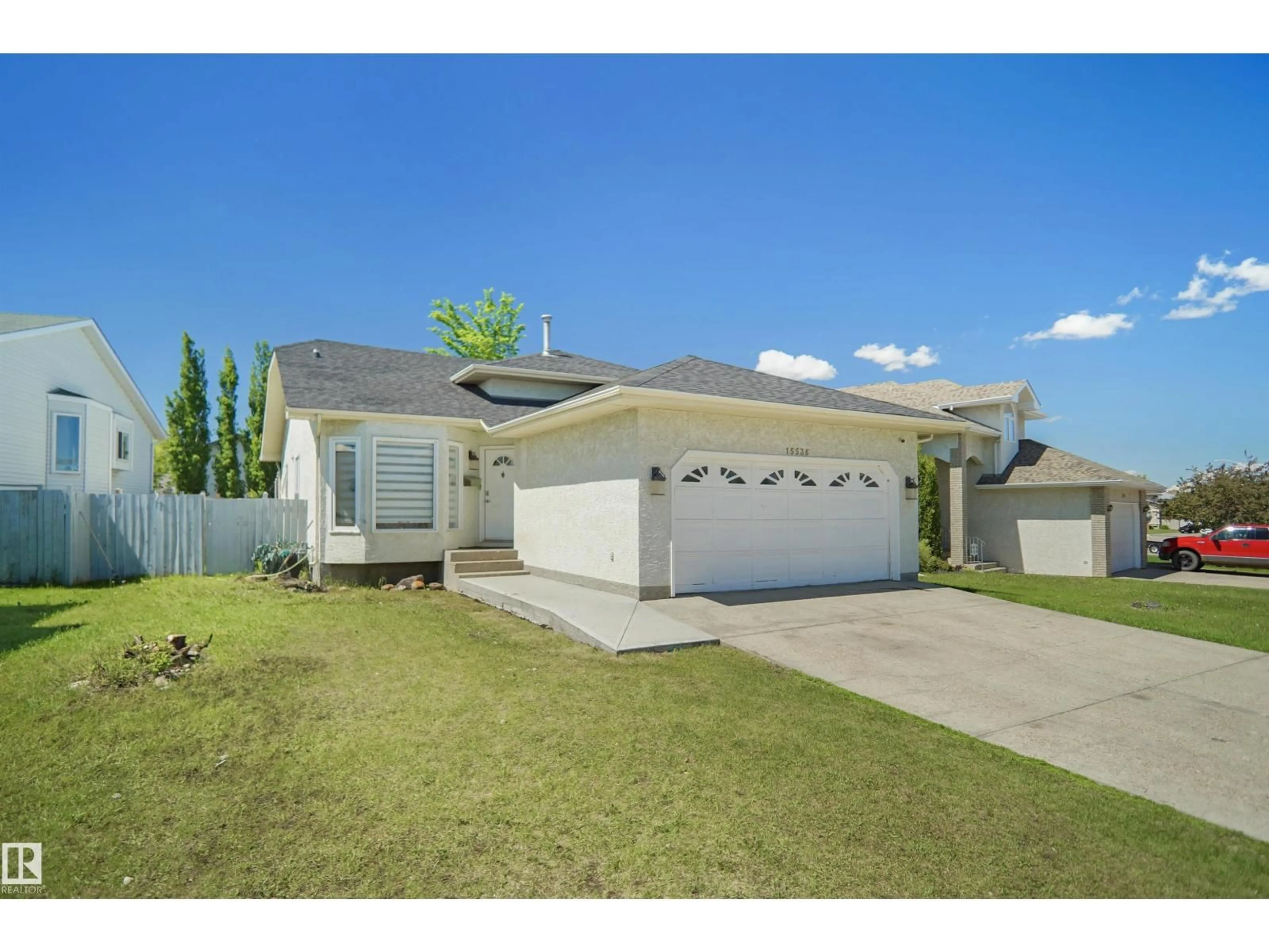 Home with vinyl exterior material, street for 15536 70 ST, Edmonton Alberta T5Z2Y6