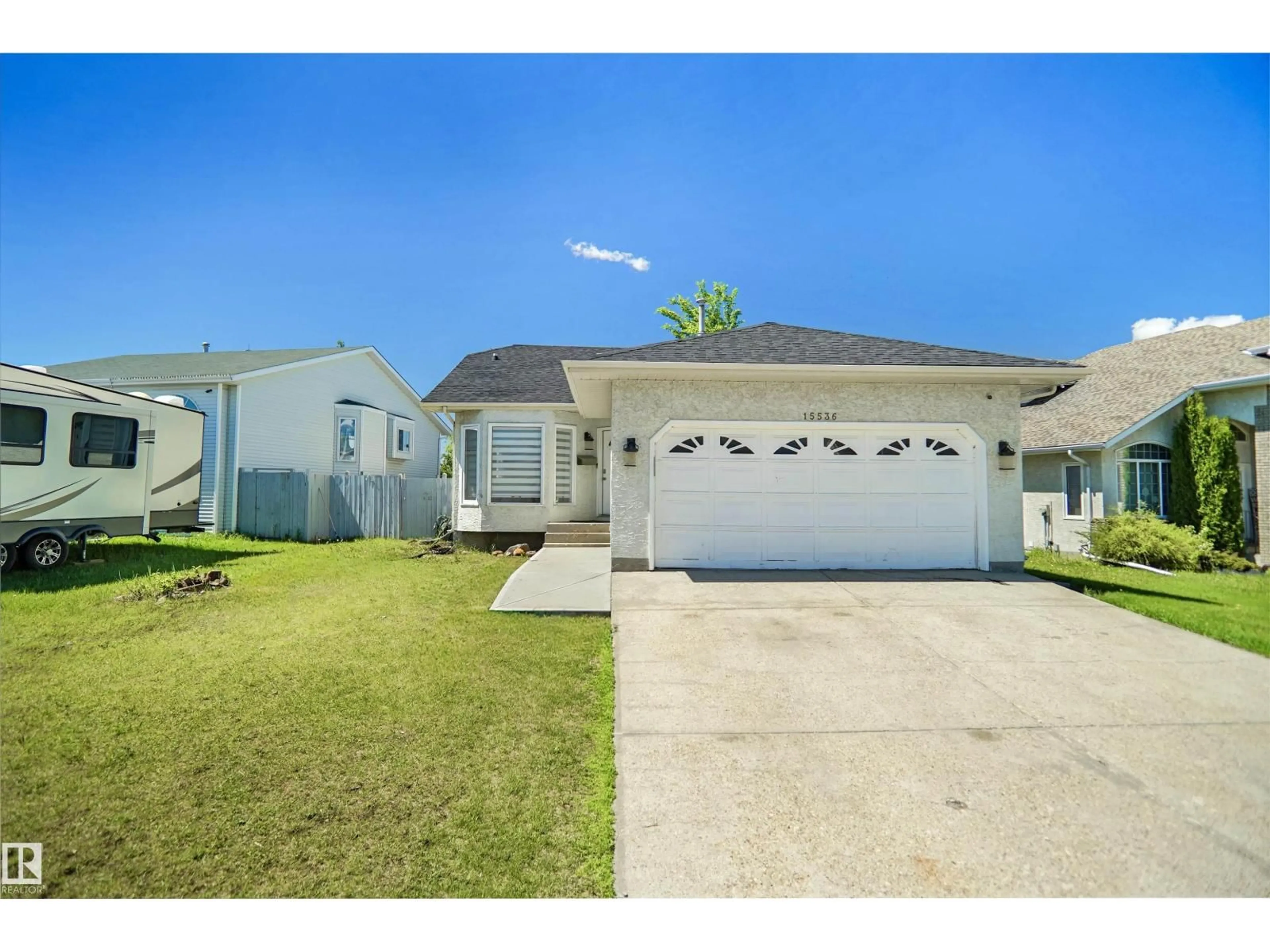 Home with vinyl exterior material, street for 15536 70 ST, Edmonton Alberta T5Z2Y6