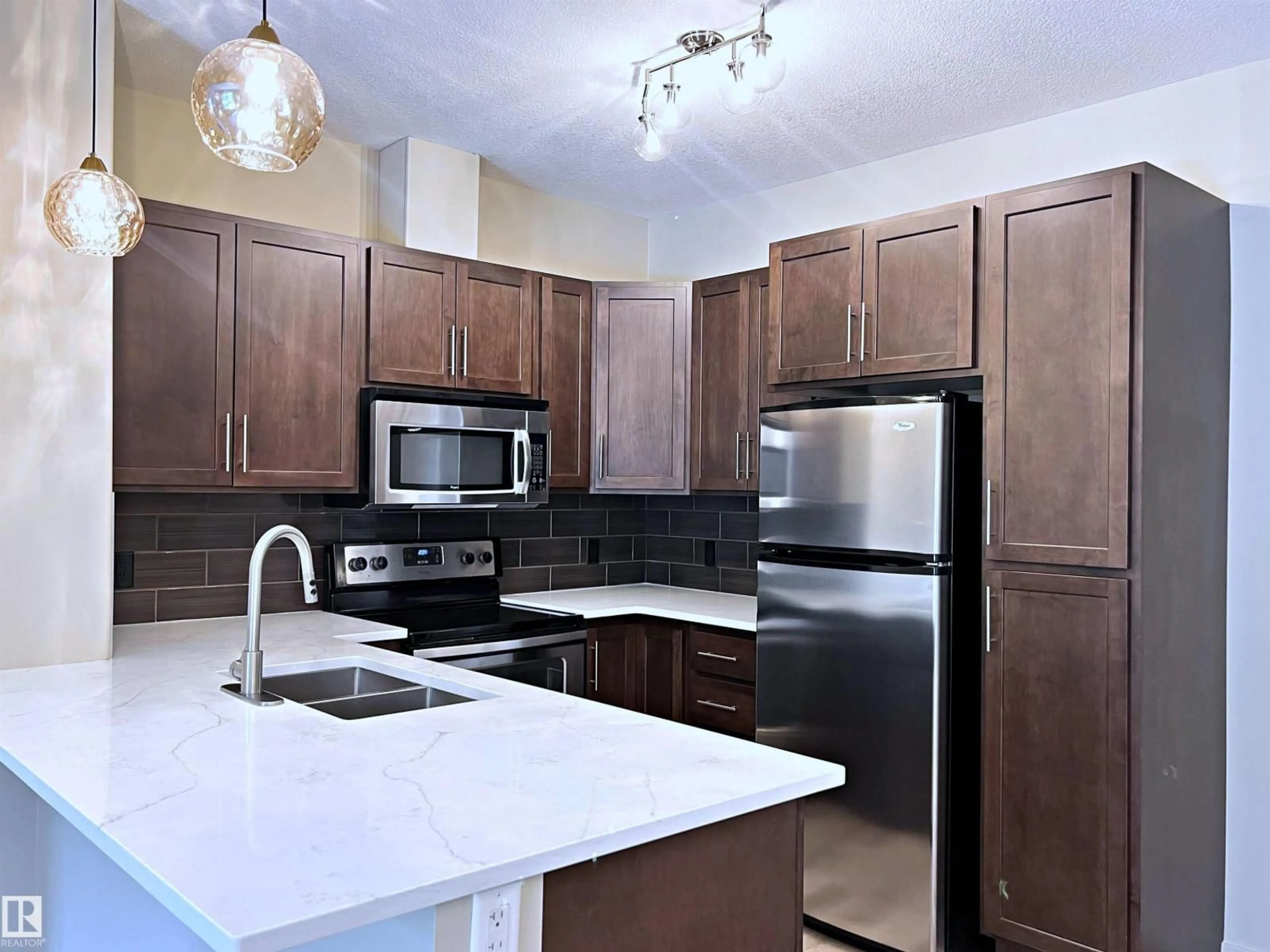 Open concept kitchen, unknown for 308 - 140 AMBLESIDE LINK LI, Edmonton Alberta T6W0V3