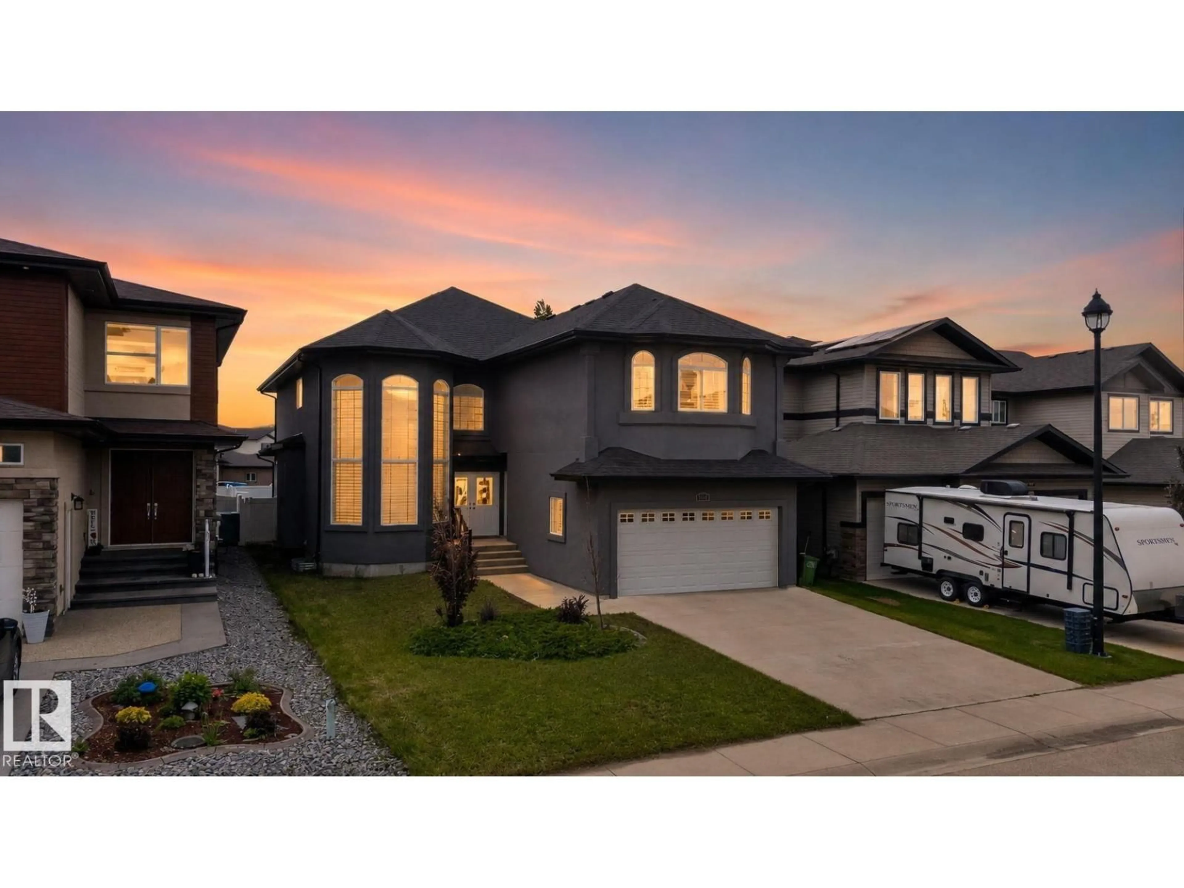 Home with vinyl exterior material, street for NW - 647 FRASER VISTA VS, Edmonton Alberta T5Y0V4