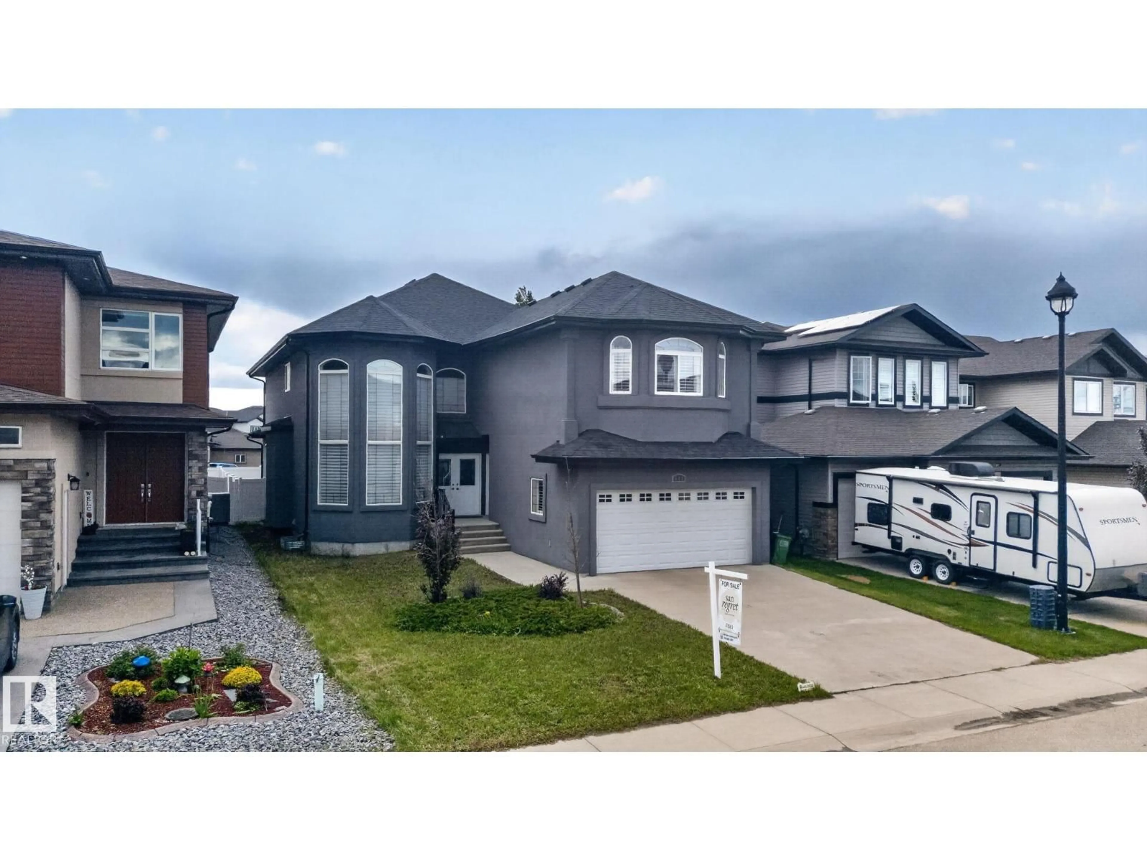 Home with vinyl exterior material, street for NW - 647 FRASER VISTA VS, Edmonton Alberta T5Y0V4