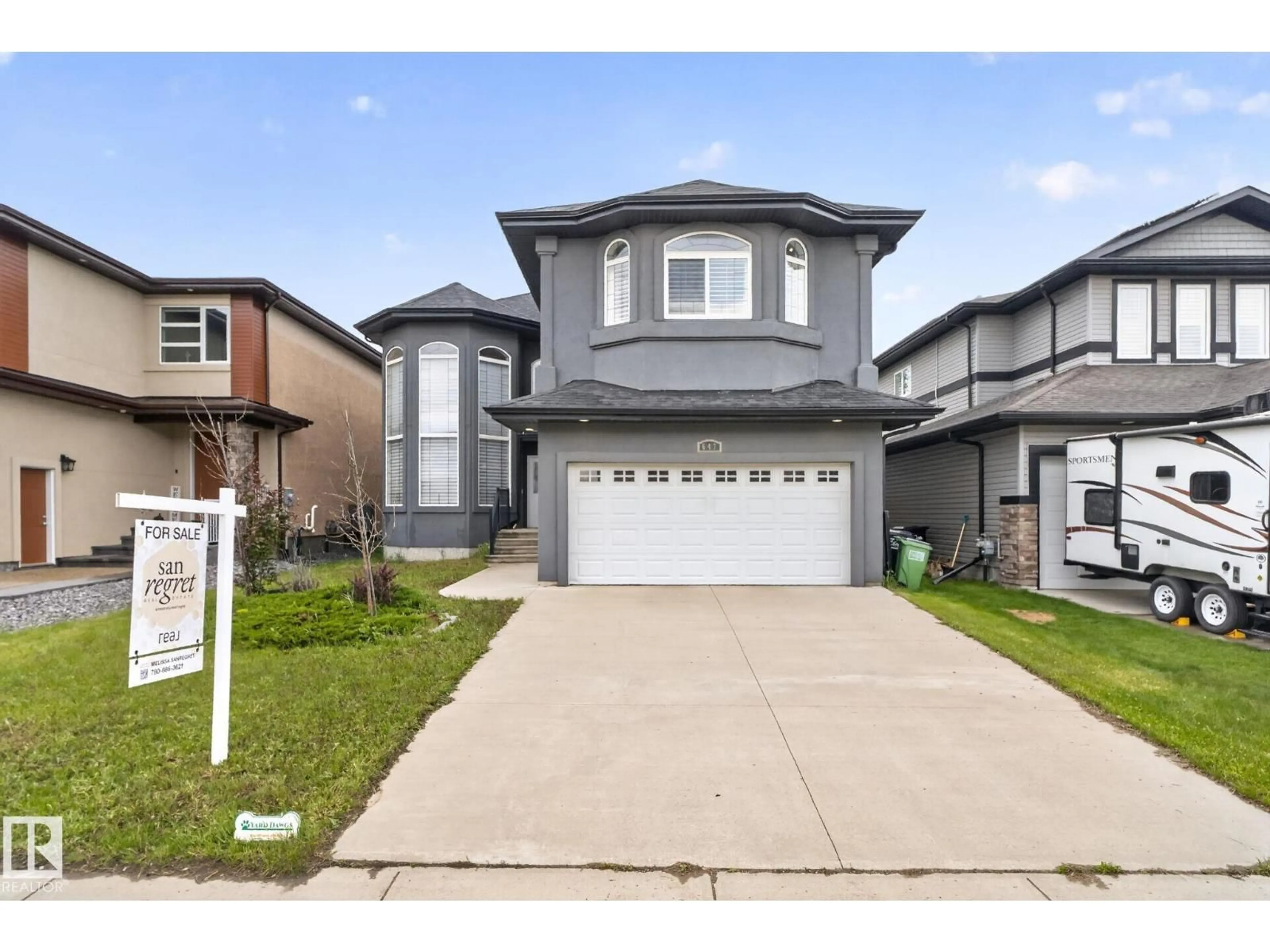 Home with vinyl exterior material, street for NW - 647 FRASER VISTA VS, Edmonton Alberta T5Y0V4