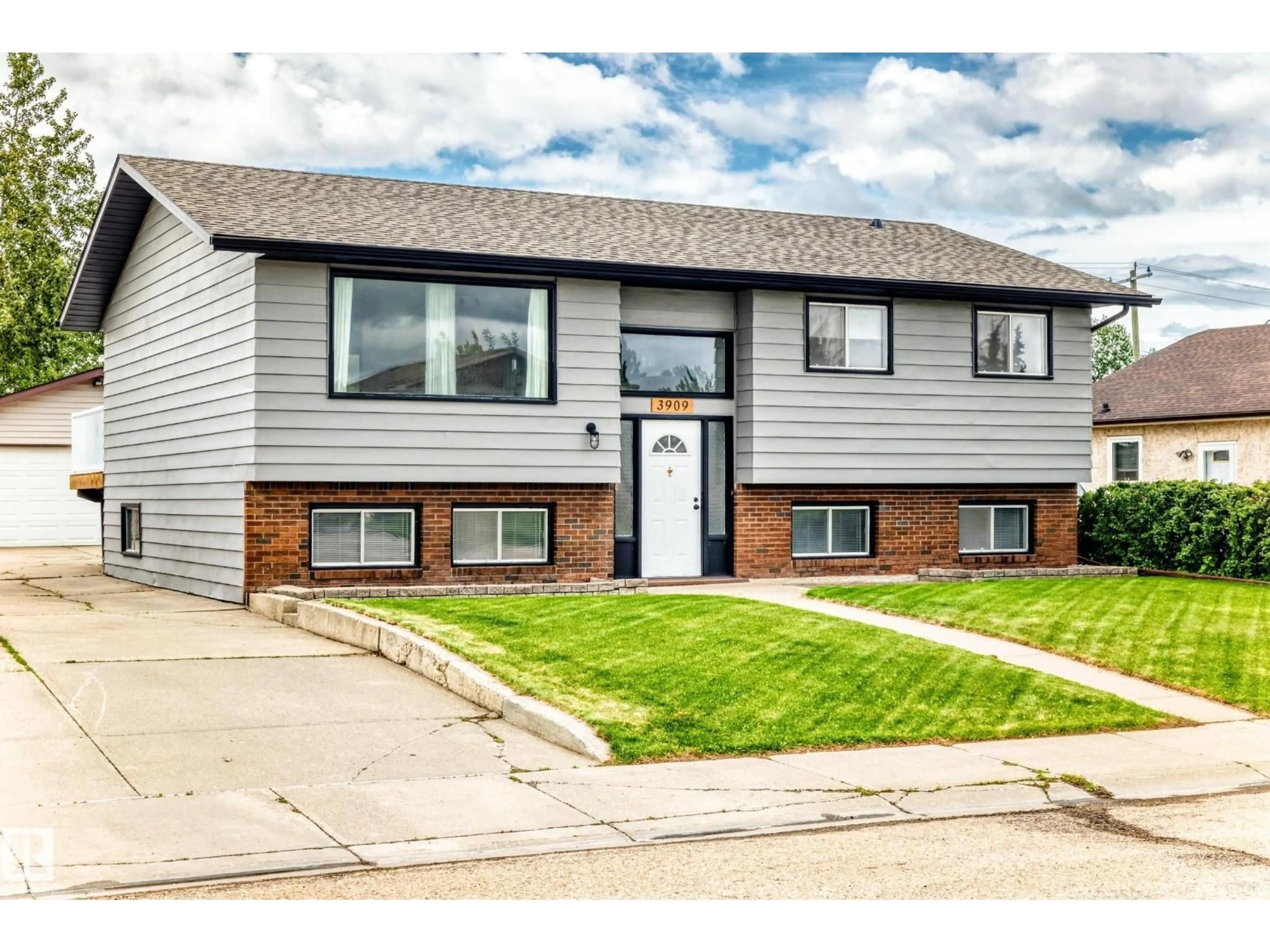 Home with vinyl exterior material, street for 3909 39 AV, Leduc Alberta T9E4W4