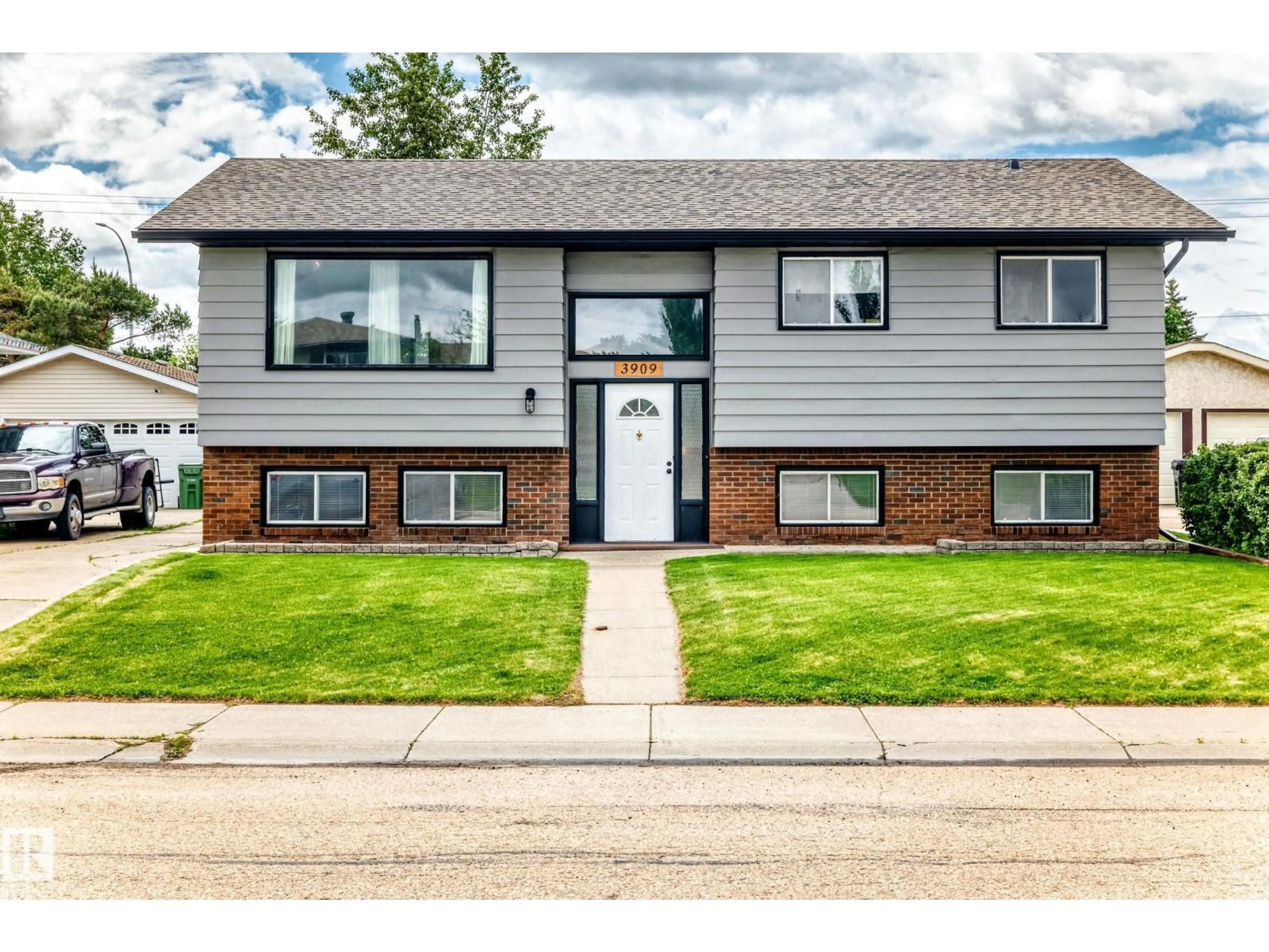 Home with vinyl exterior material, street for 3909 39 AV, Leduc Alberta T9E4W4
