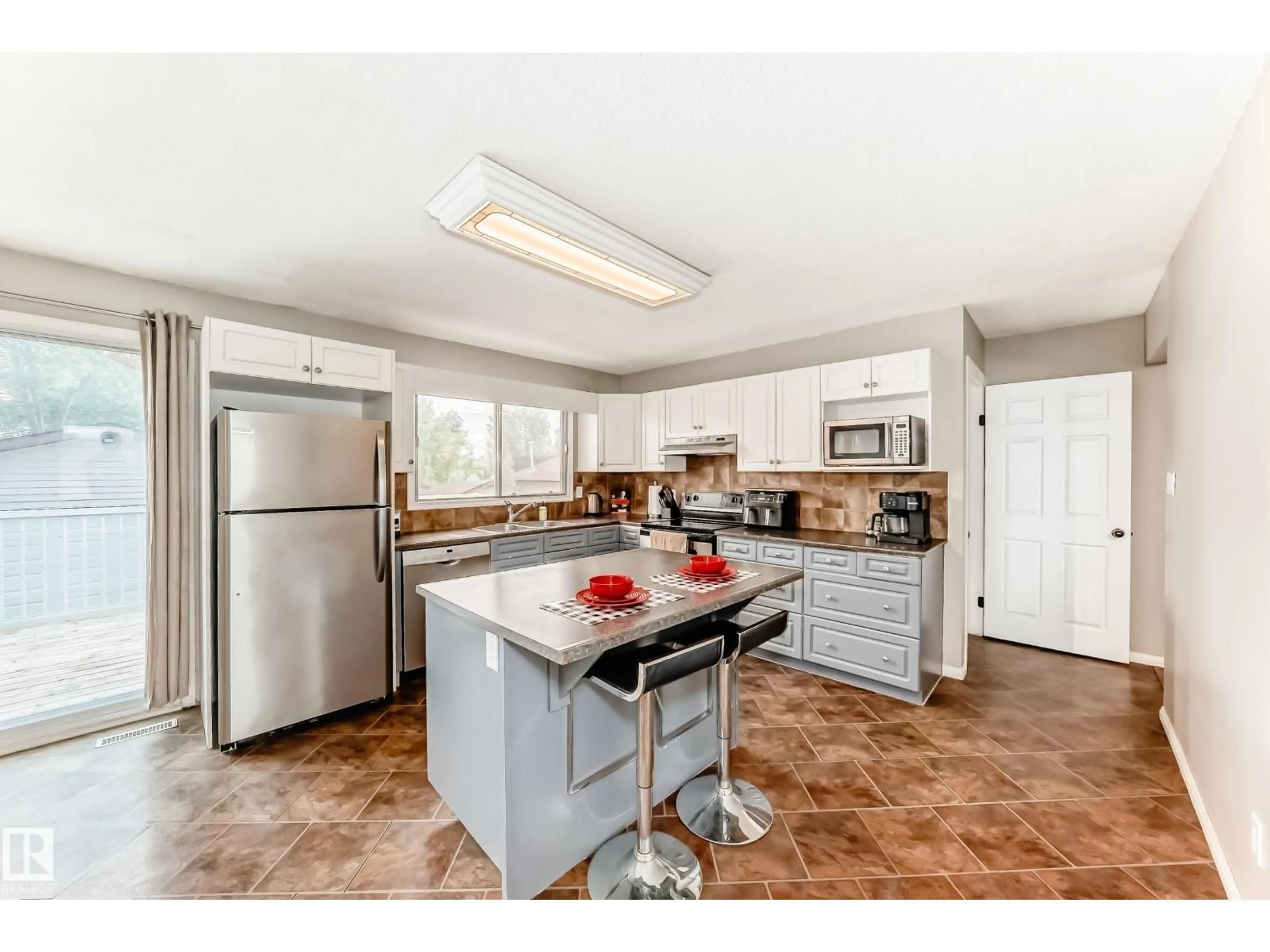 Open concept kitchen, ceramic/tile floor for 3909 39 AV, Leduc Alberta T9E4W4
