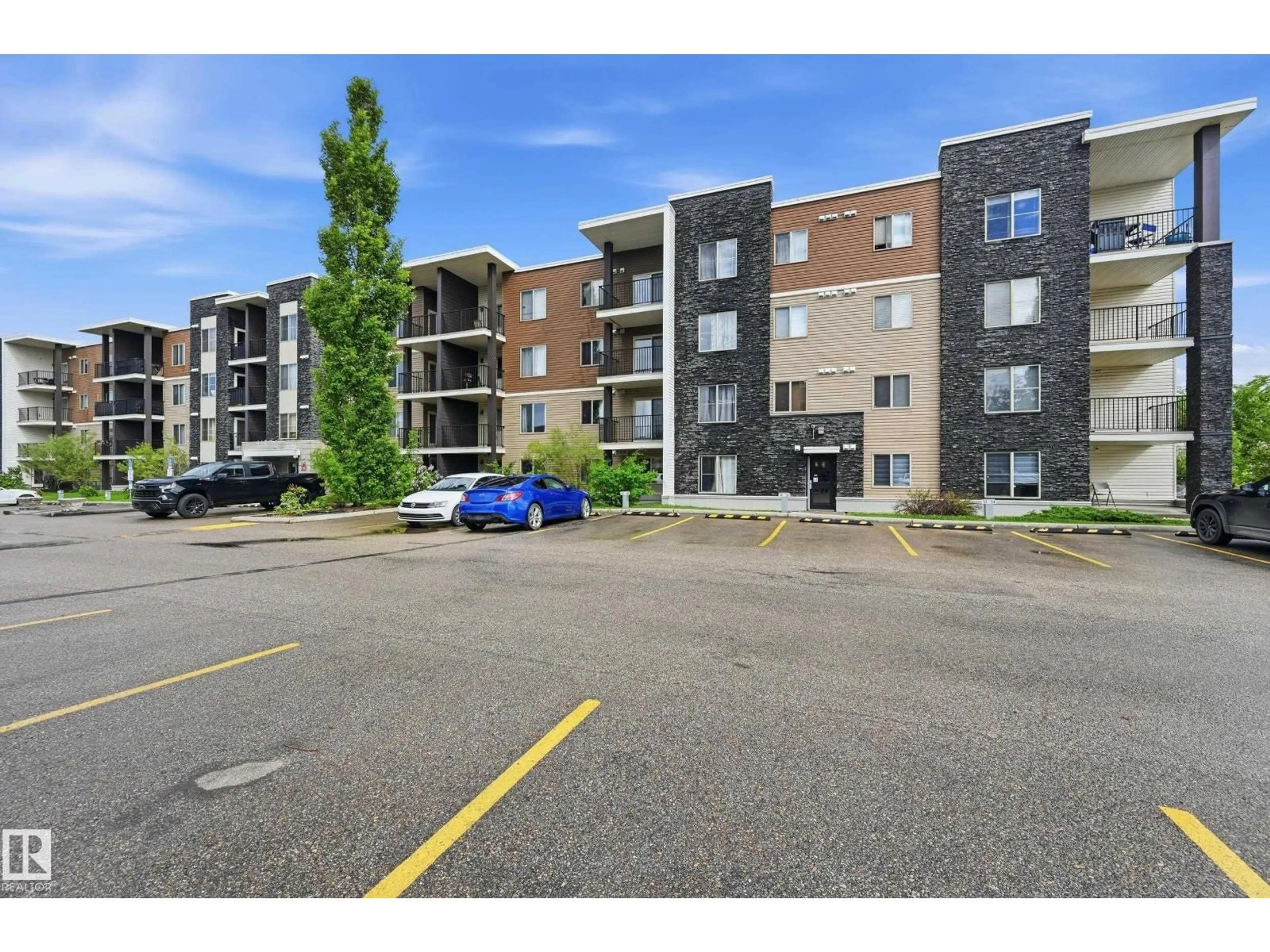 A pic from outside/outdoor area/front of a property/back of a property/a pic from drone, street for #304 - 11804 22 AV, Edmonton Alberta T6W2A2