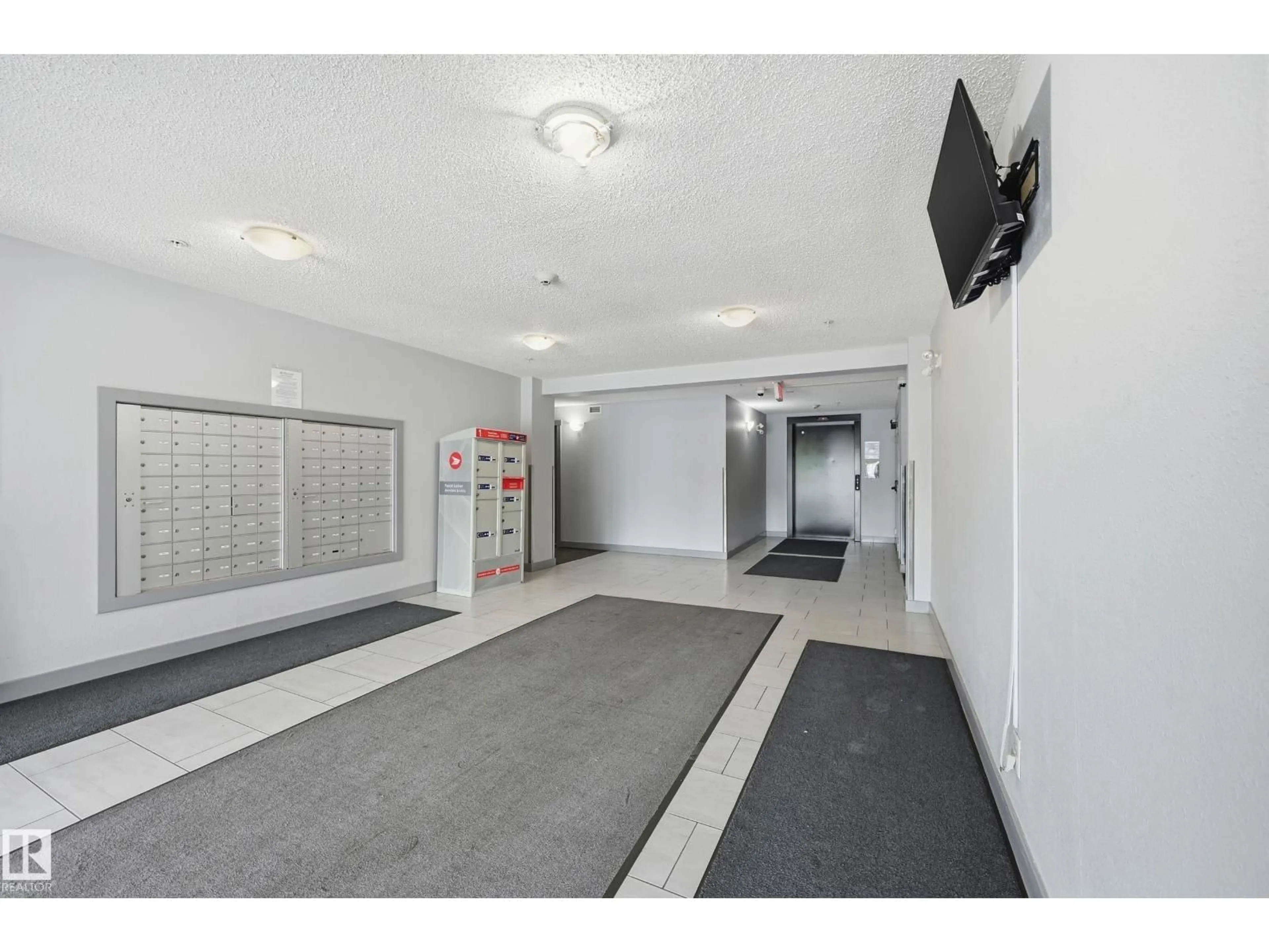 Indoor foyer for #304 - 11804 22 AV, Edmonton Alberta T6W2A2