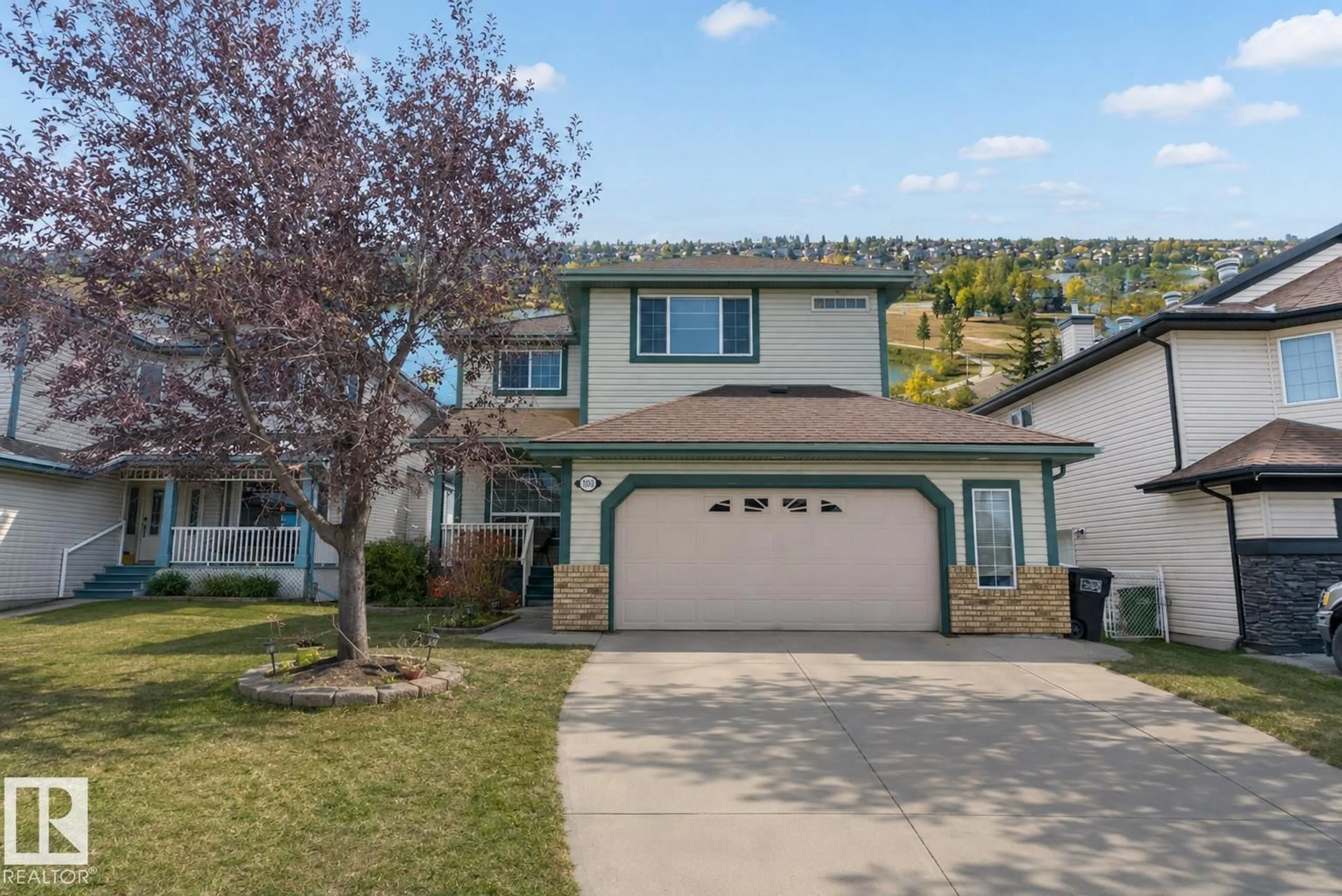 Home with vinyl exterior material, street for 1105 KLARVATTEN CV, Edmonton Alberta T5Z3N3