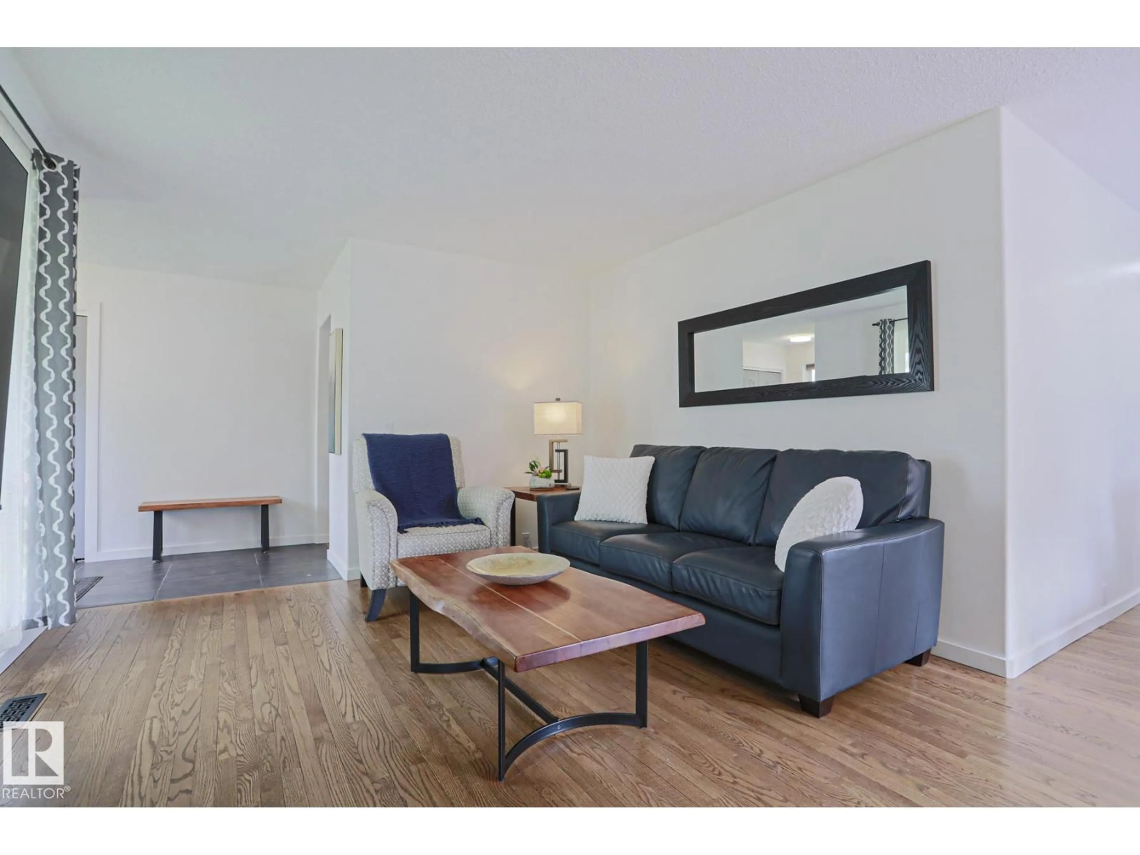 Living room with furniture, wood/laminate floor for 17 GEORGIAN WY, Sherwood Park Alberta T8A2T8