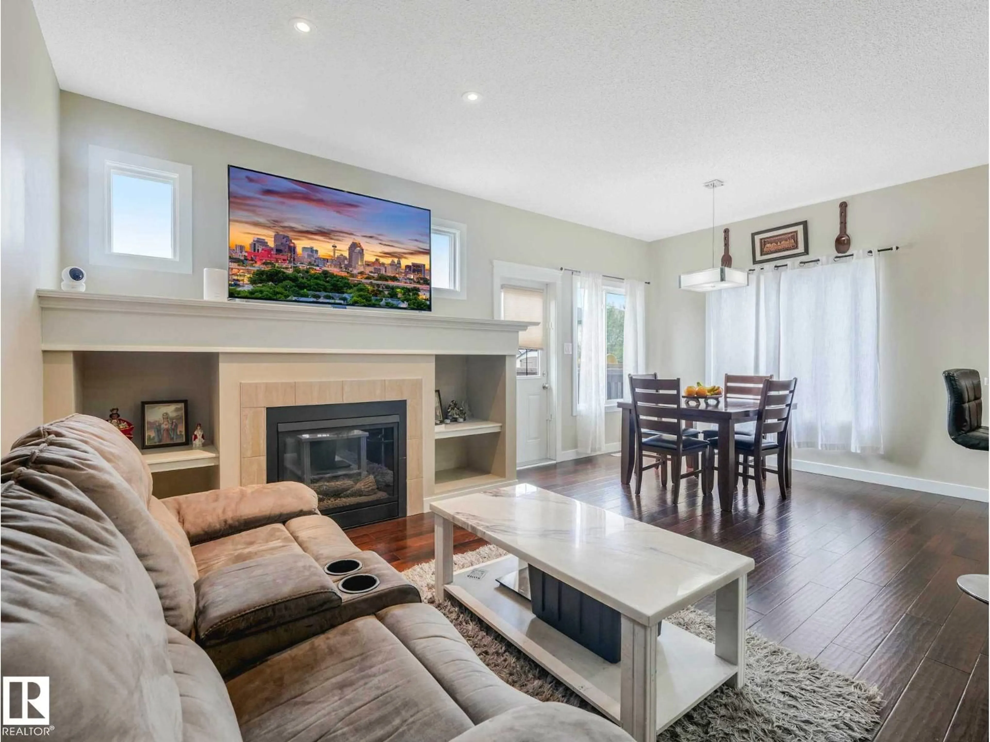 Living room with furniture, wood/laminate floor for 68 MEADOWPARK GA, Spruce Grove Alberta T7X0T9