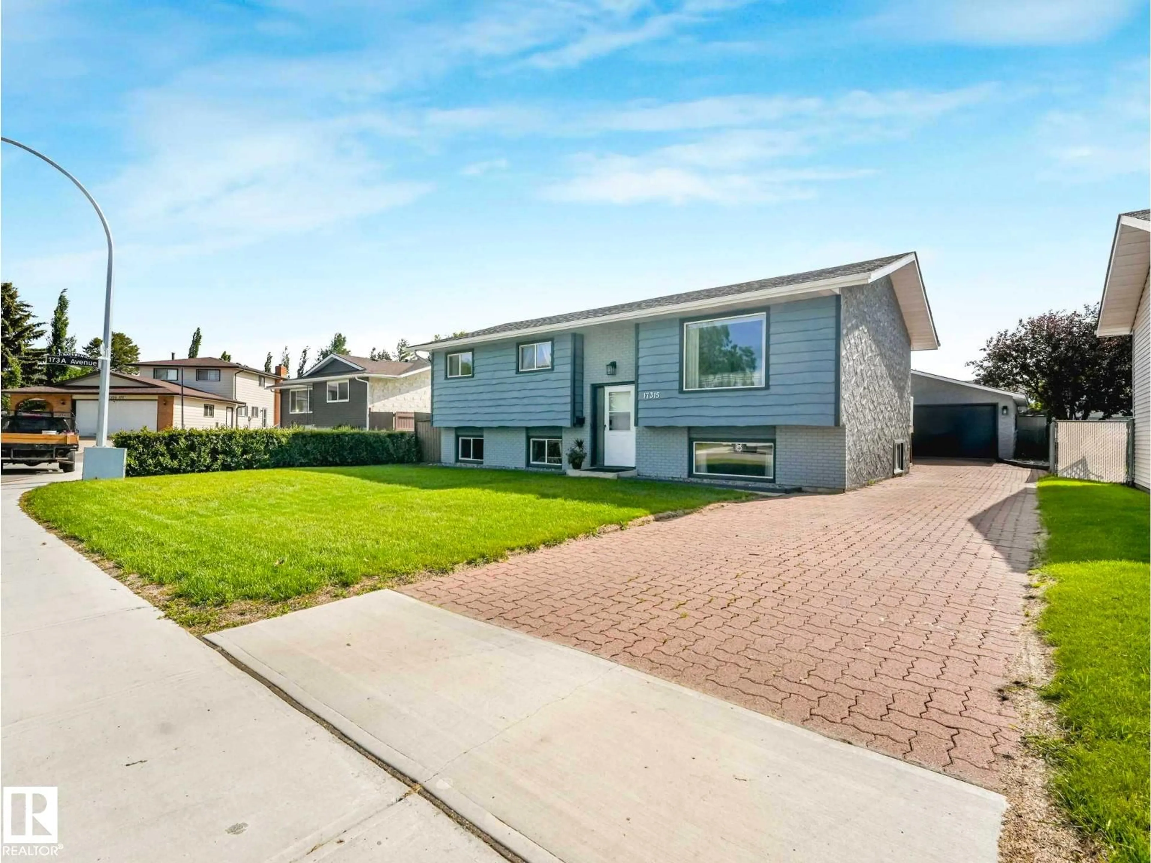 Home with vinyl exterior material, street for 17315 111 ST, Edmonton Alberta T5X3J7