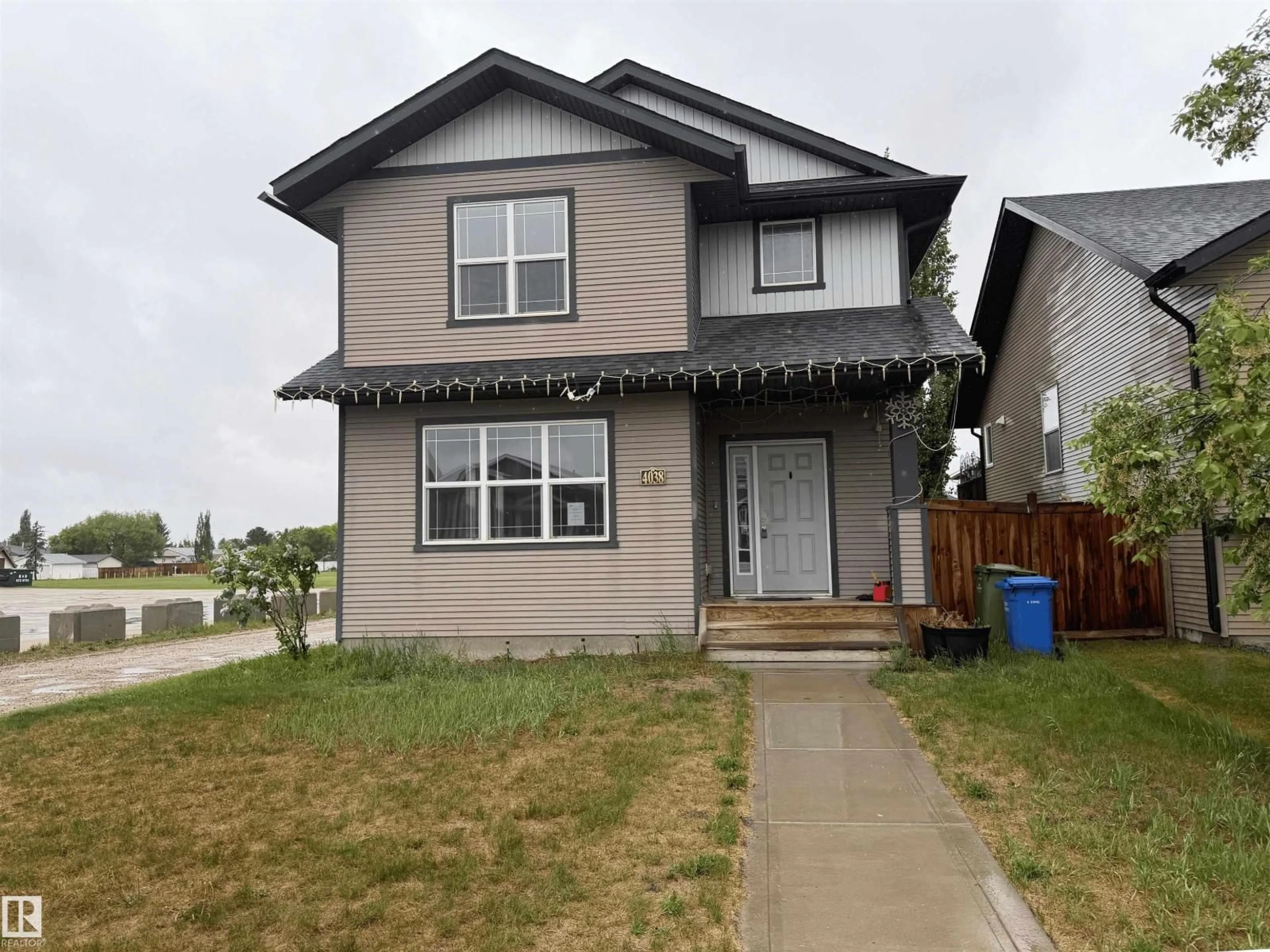 Home with vinyl exterior material, street for 4038 56 AV, Wetaskiwin Alberta T9A1X6