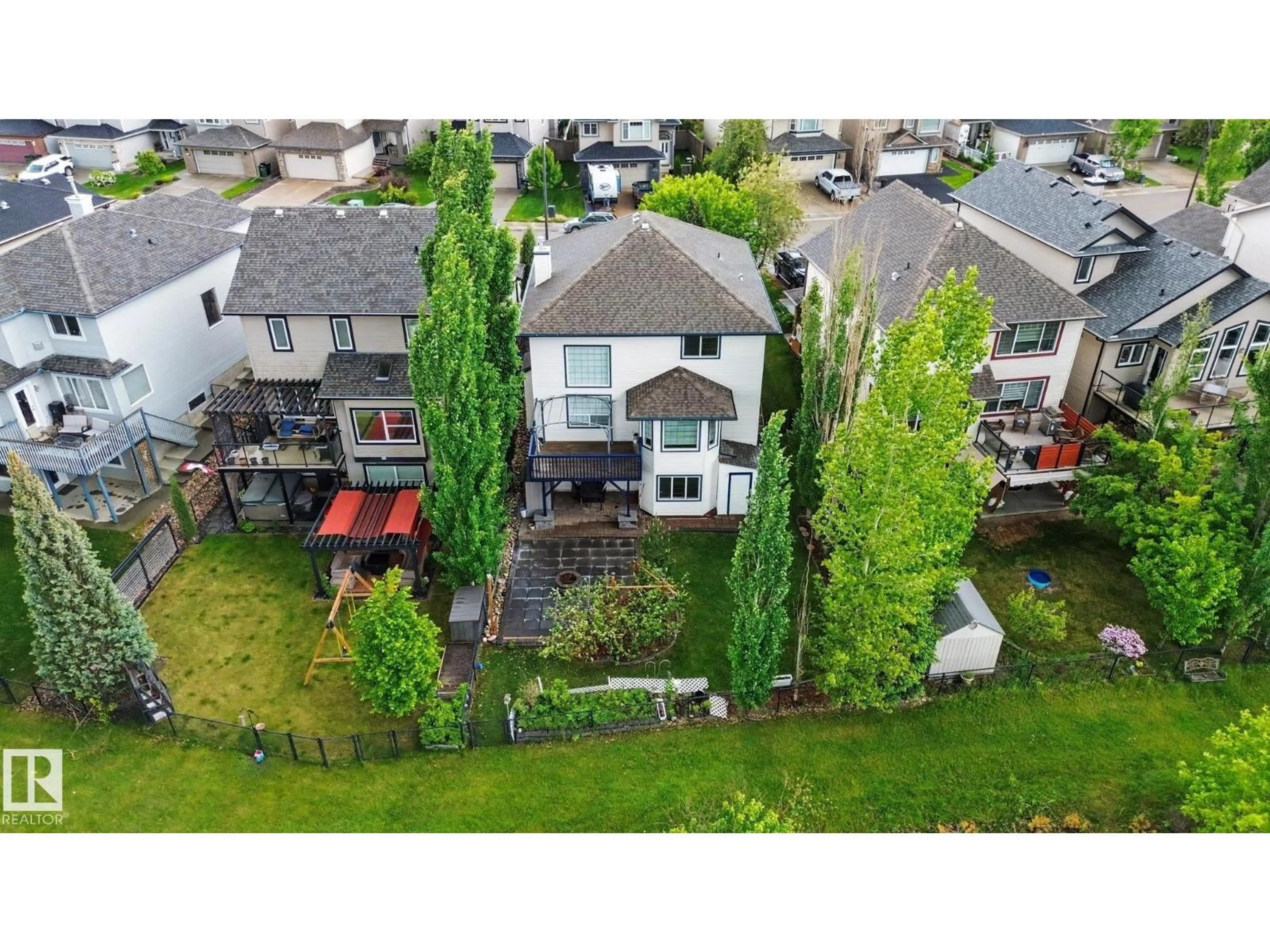 A pic from outside/outdoor area/front of a property/back of a property/a pic from drone, street for 7365 SINGER WY, Edmonton Alberta T6R3S1