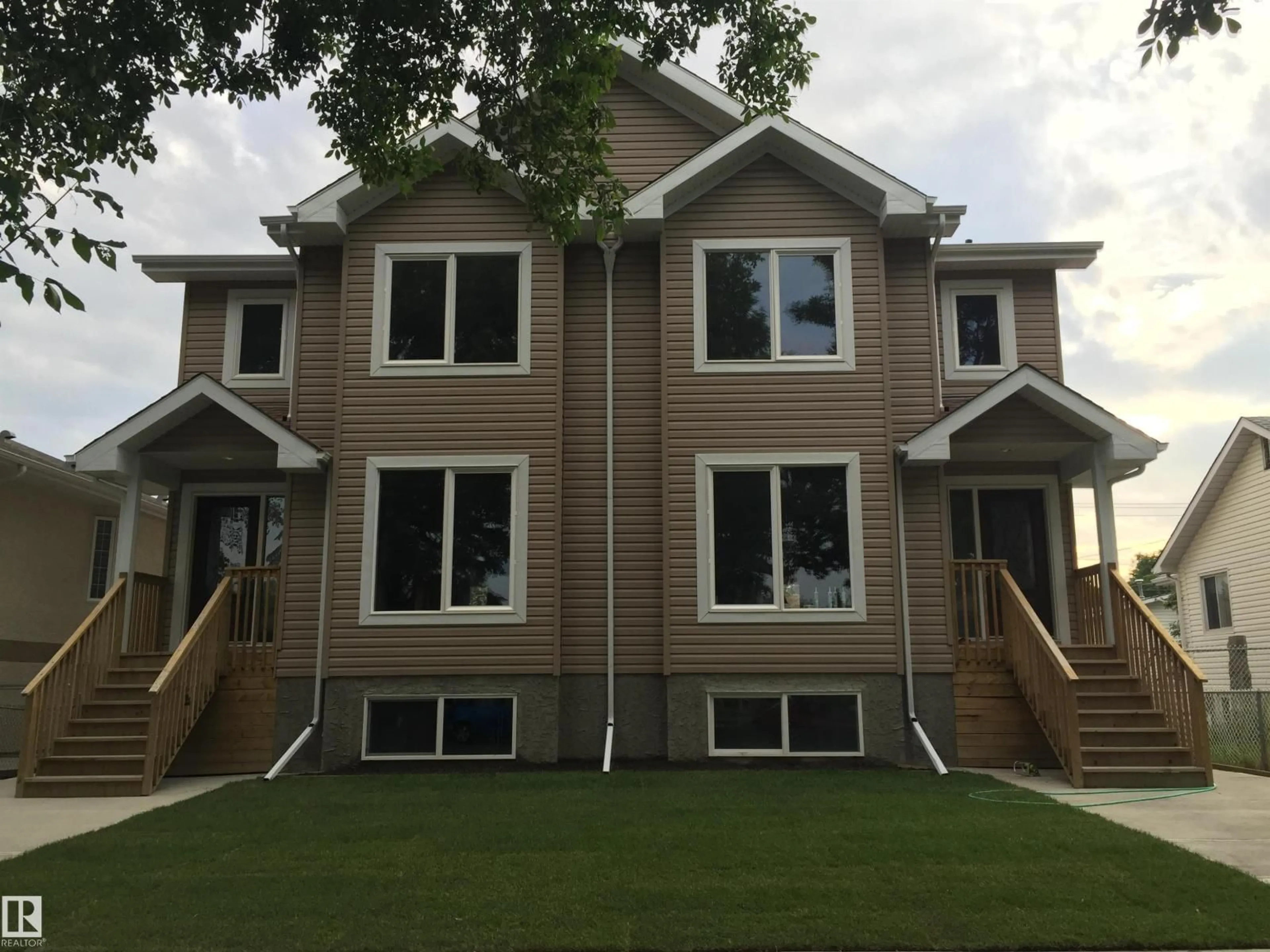 Home with vinyl exterior material, unknown for 12224 88 ST, Edmonton Alberta T5B3S8