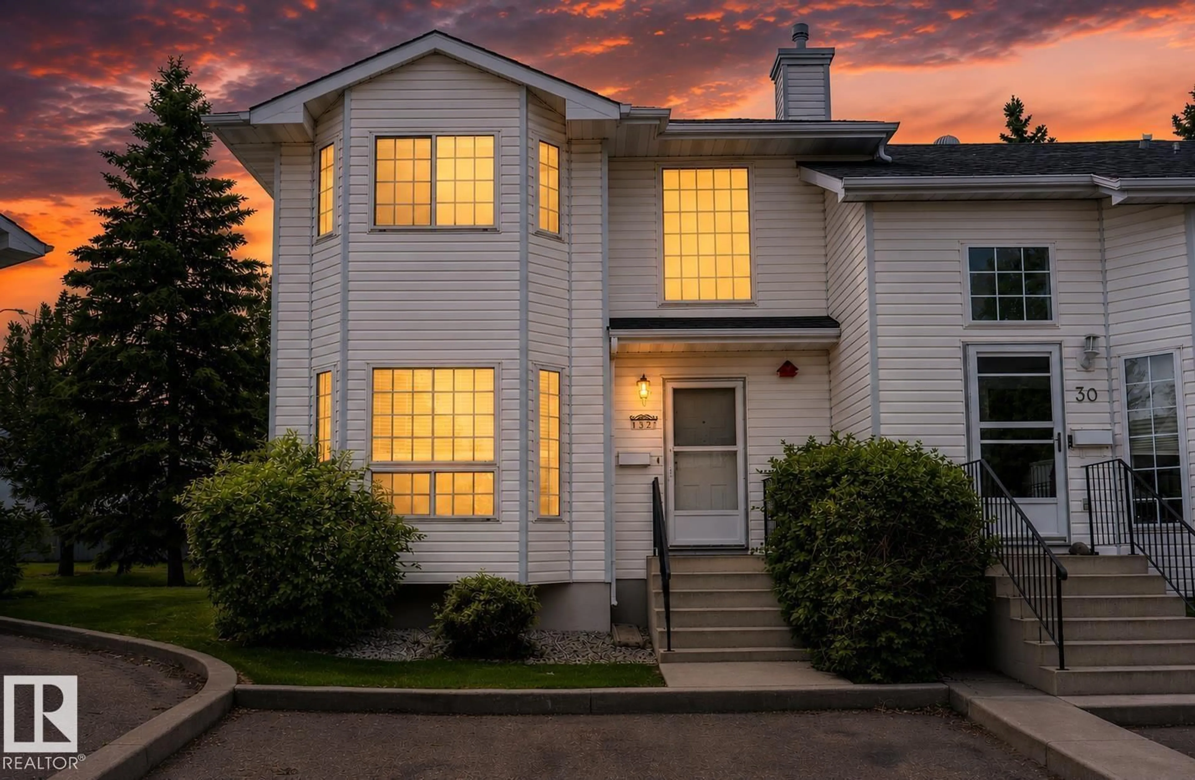 Home with vinyl exterior material, street for #32 - 3311 58 ST NW, Edmonton Alberta T6L6X3