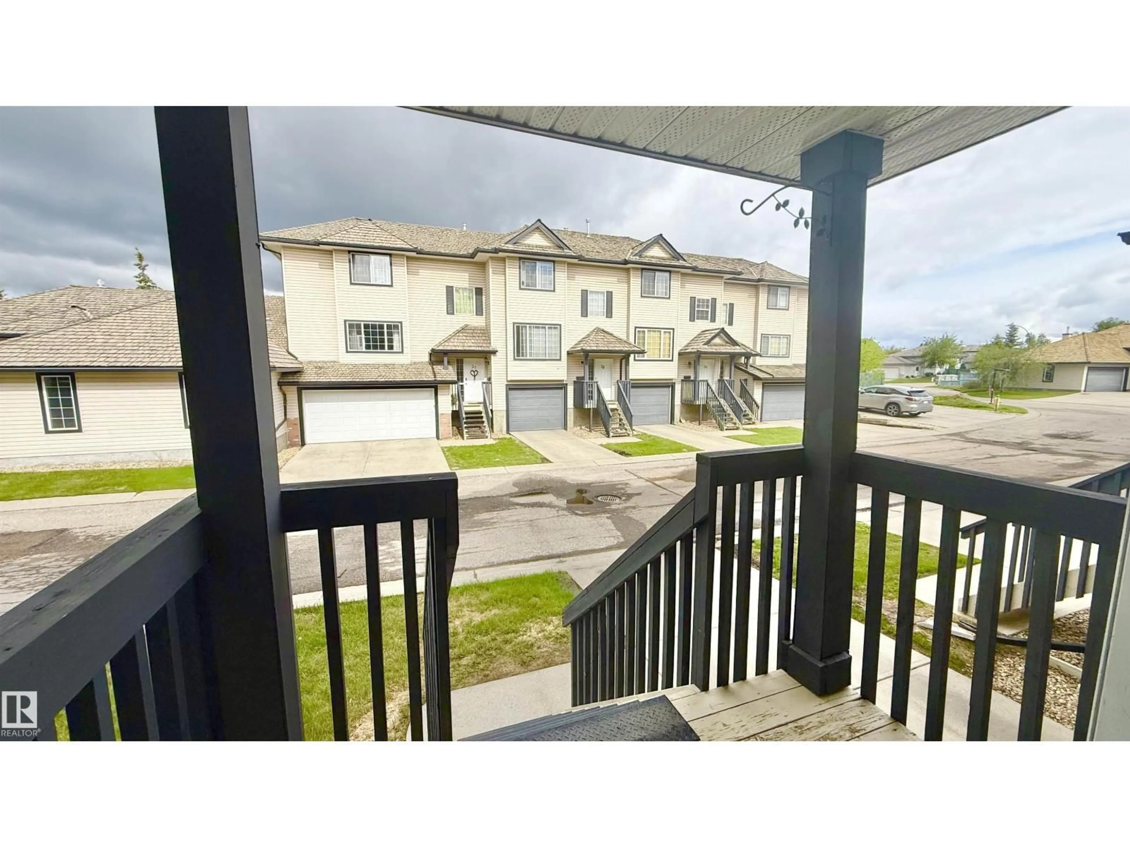 A pic from outside/outdoor area/front of a property/back of a property/a pic from drone, unknown for #9 - 225 BLACKBURN DR, Edmonton Alberta T6W1H1