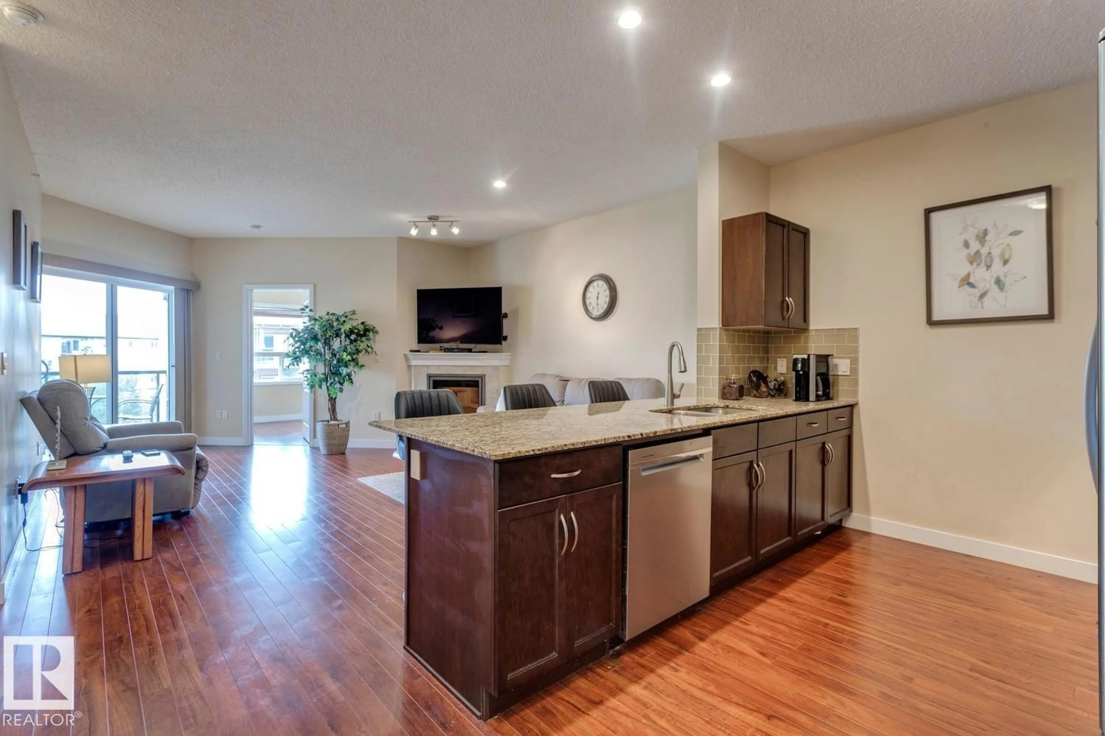 Open concept kitchen, wood/laminate floor for 2045 - 426 GRANTHAM CT, Edmonton Alberta T5T3X6